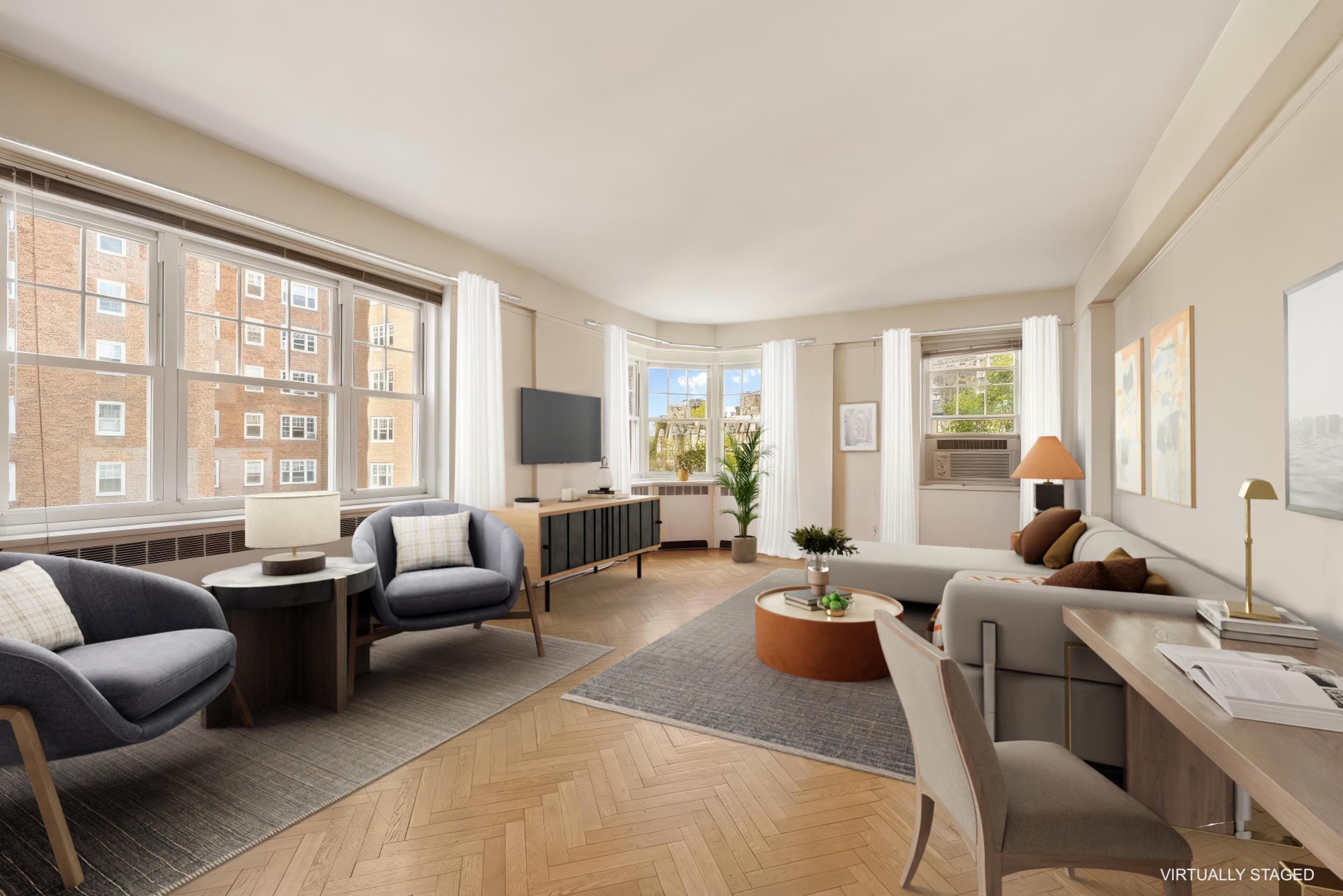 a living room with furniture large windows and flat screen tv