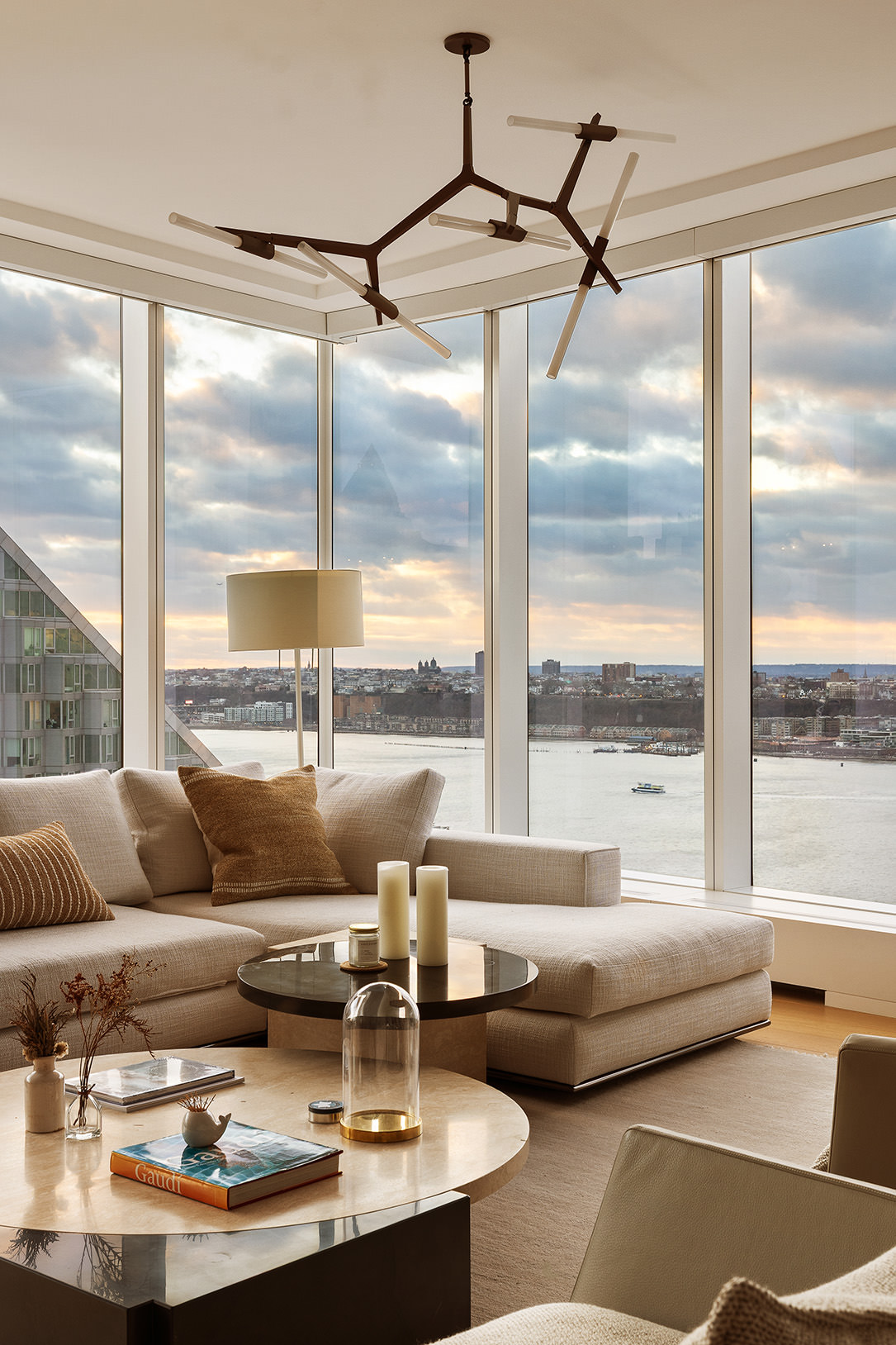 1 West End Avenue, Unit 25F Manhattan, NY 10023 - Photo 3 of 15 a living room with furniture and a large window with balcony view