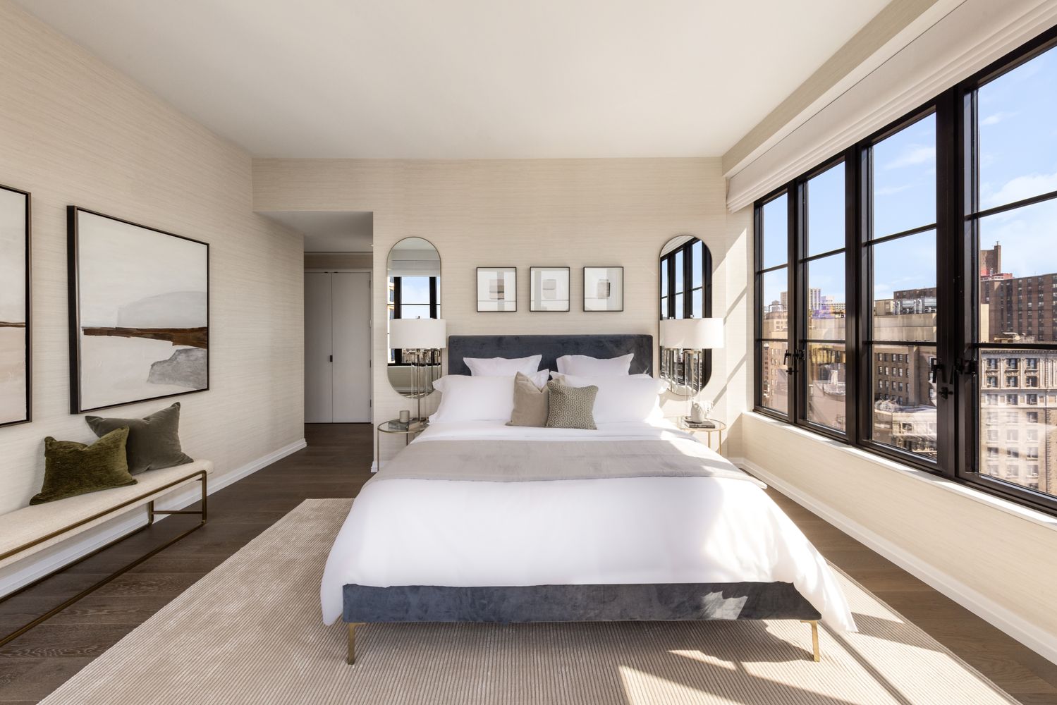 250 West 96th Street, Unit 20D Manhattan, NY 10025 - Photo 8 of 34 a spacious bedroom with a large bed and a large window