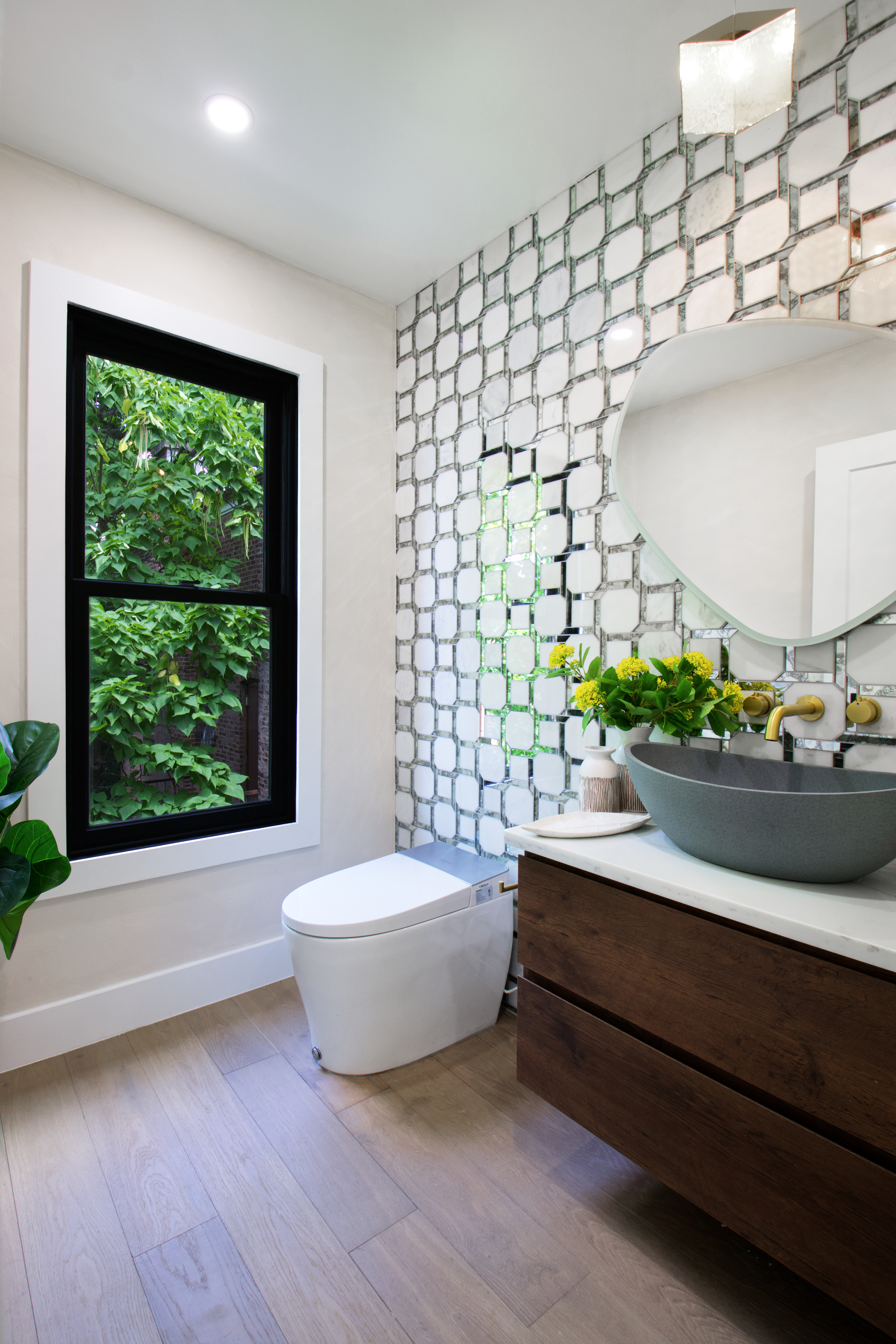 255 Macon Street Brooklyn, NY 11216 - Photo 23 of 36 a bathroom with a sink and a bathtub