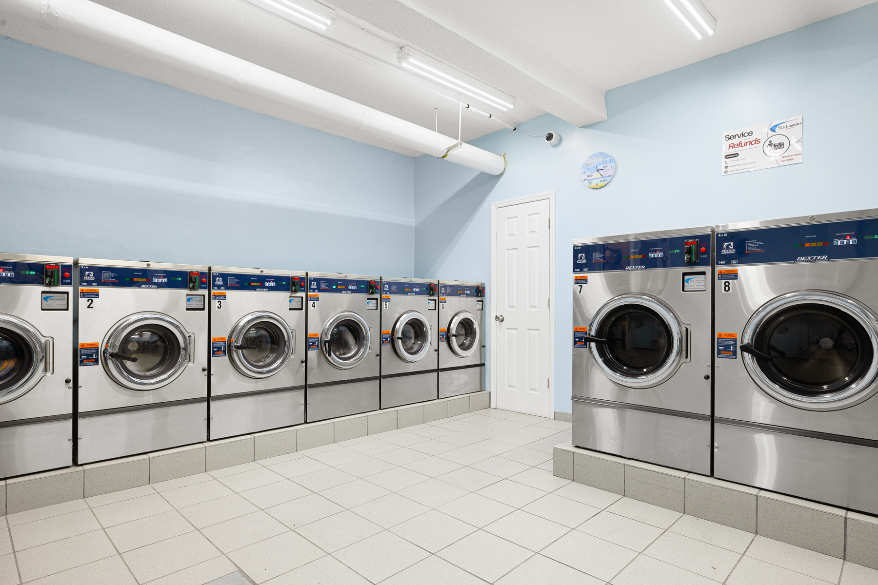 77-11 35th Avenue, Unit 3N Queens, NY 11372 - Photo 19 of 21 a utility room with dryer and washer