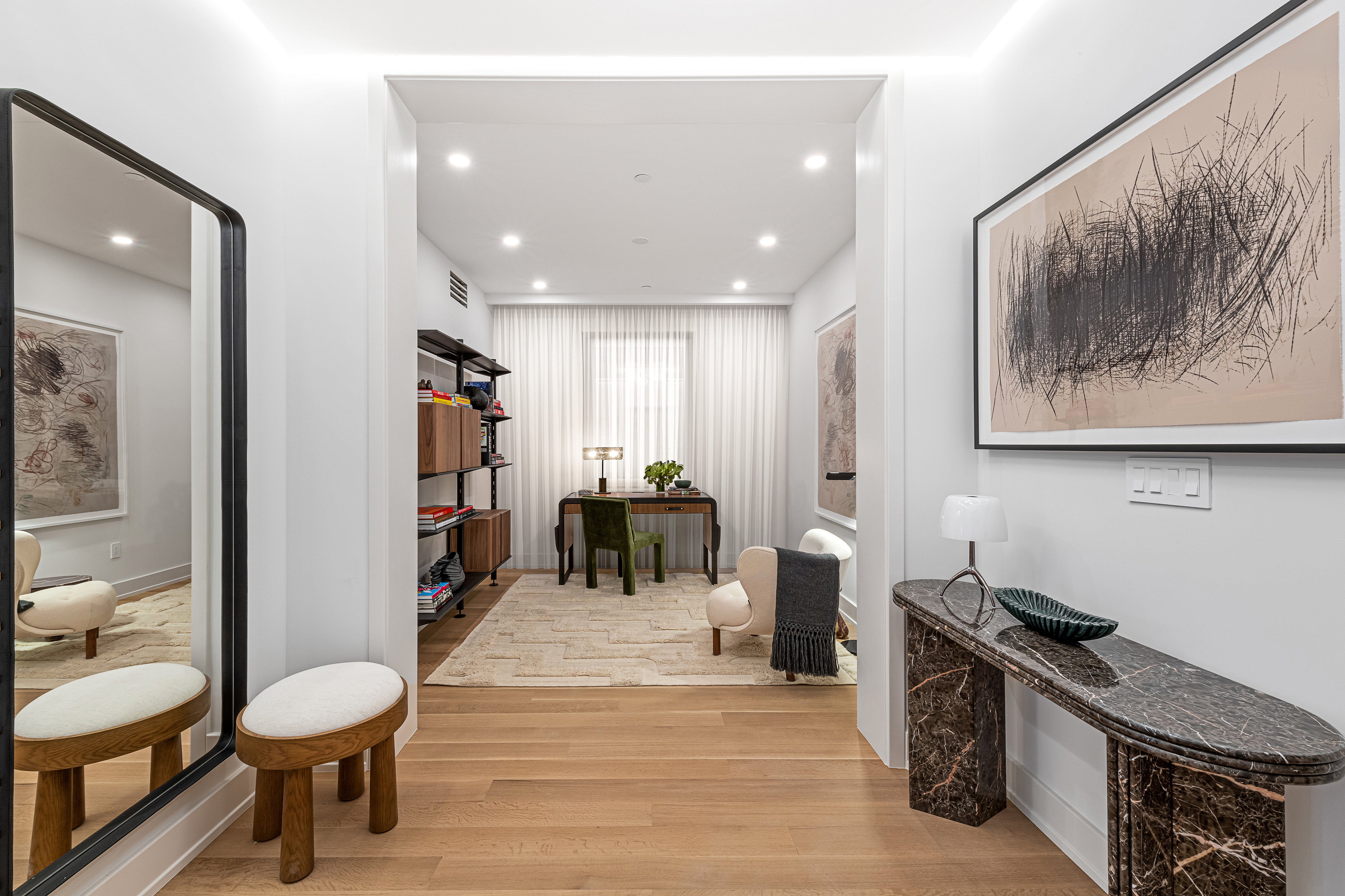 420 East 75th Street, Unit 3 Manhattan, NY 10021 - Photo 5 of 13 a living room with furniture and a wooden floor