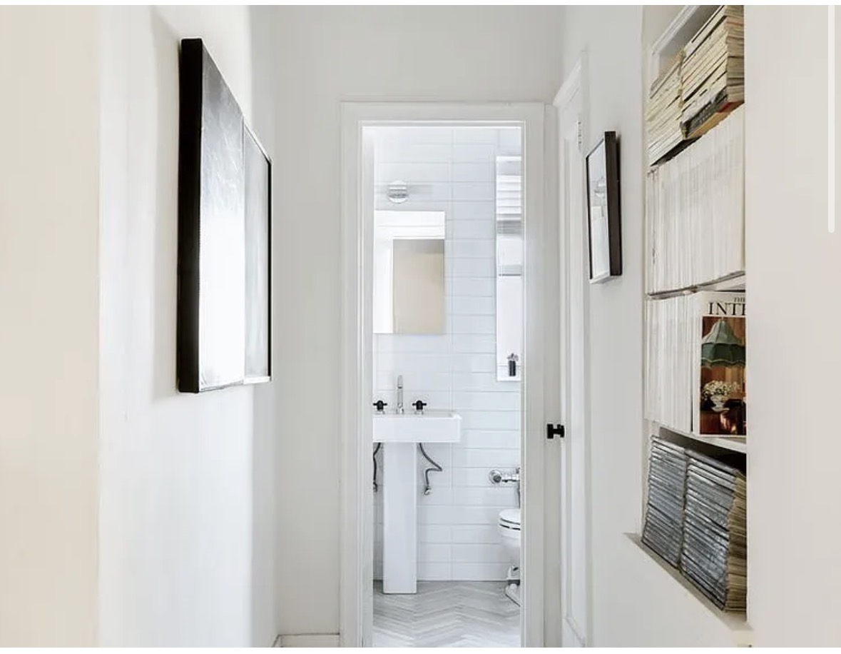 357 West 55th Street, Unit 6M Manhattan, NY 10019 - Photo 7 of 8 a bathroom with a shower and a mirror