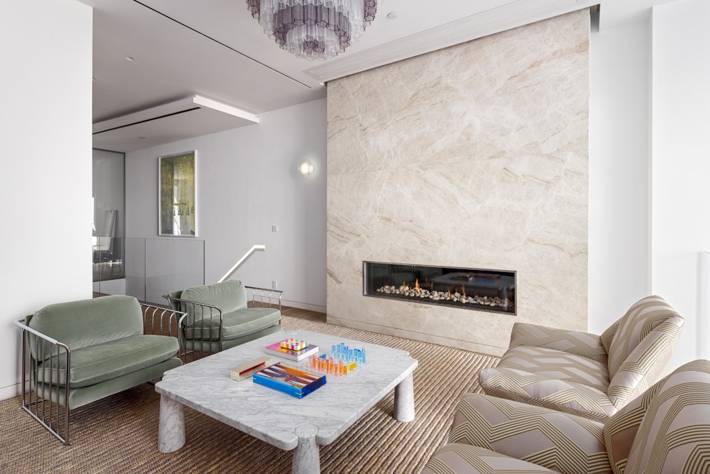 125 West 87th Street Manhattan, NY 10024 - Photo 2 of 27 a living room with furniture and a wooden floor