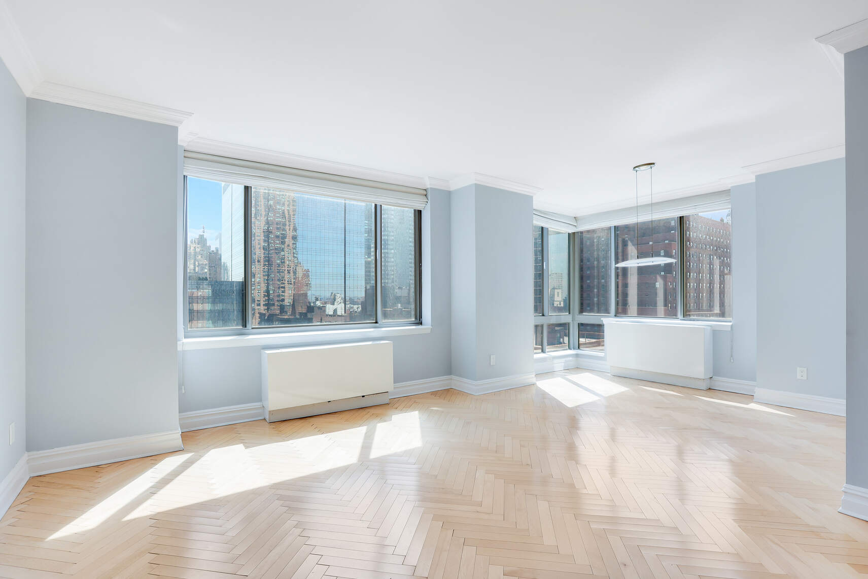 2 Columbus Avenue, Unit 17C Manhattan, NY 10023 - Photo 10 of 26 a view of an empty room with a window