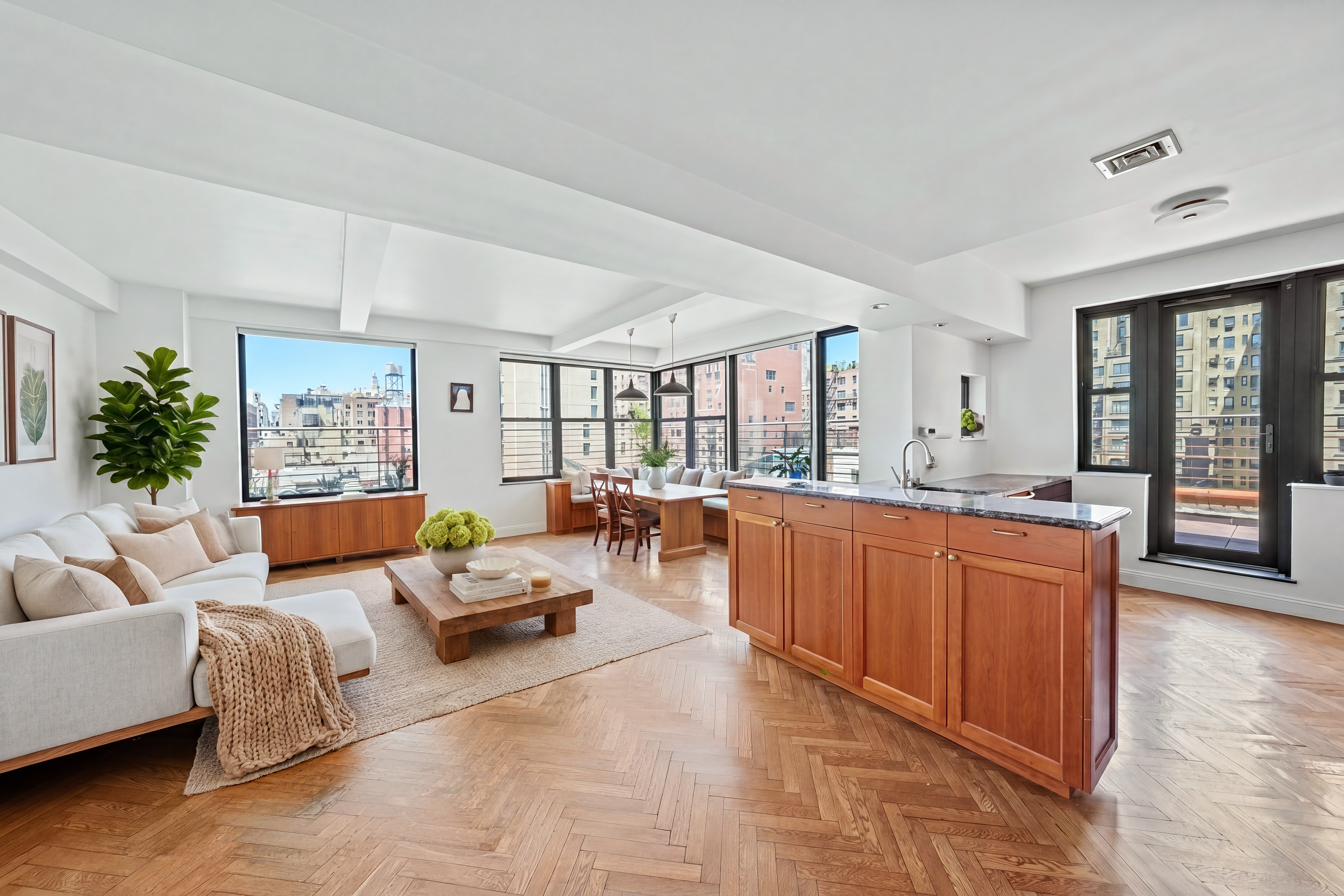 177 East 77th Street, Unit PHC Manhattan, NY 10075 - Photo 5 of 26 a living room with furniture and a large window