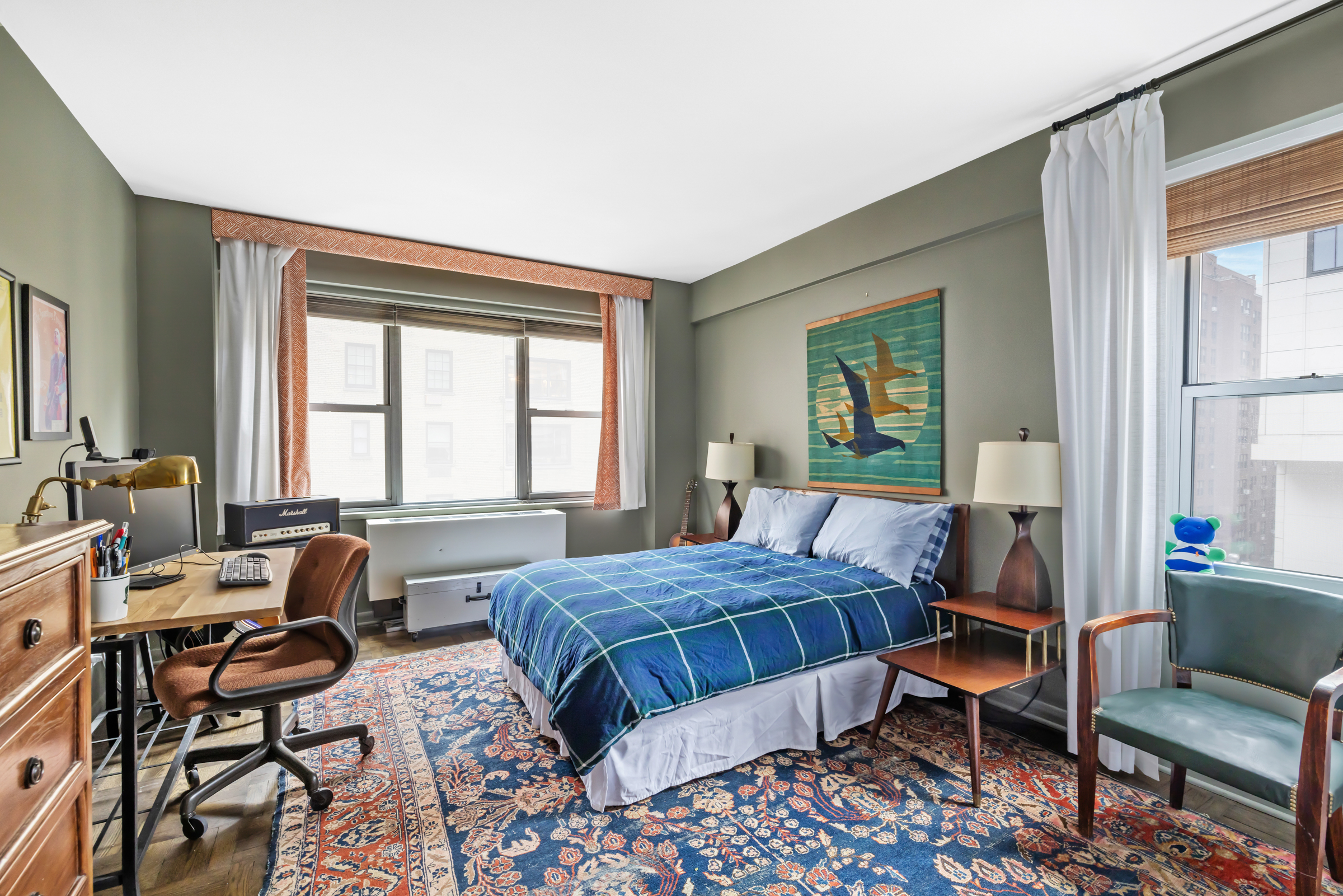 16 Sutton Place, Unit 11A Manhattan, NY 10022 - Photo 11 of 19 a bedroom with a bed and large windows