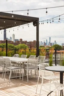 a view of a terrace with furniture