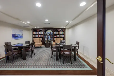 a view of a dining room with furniture