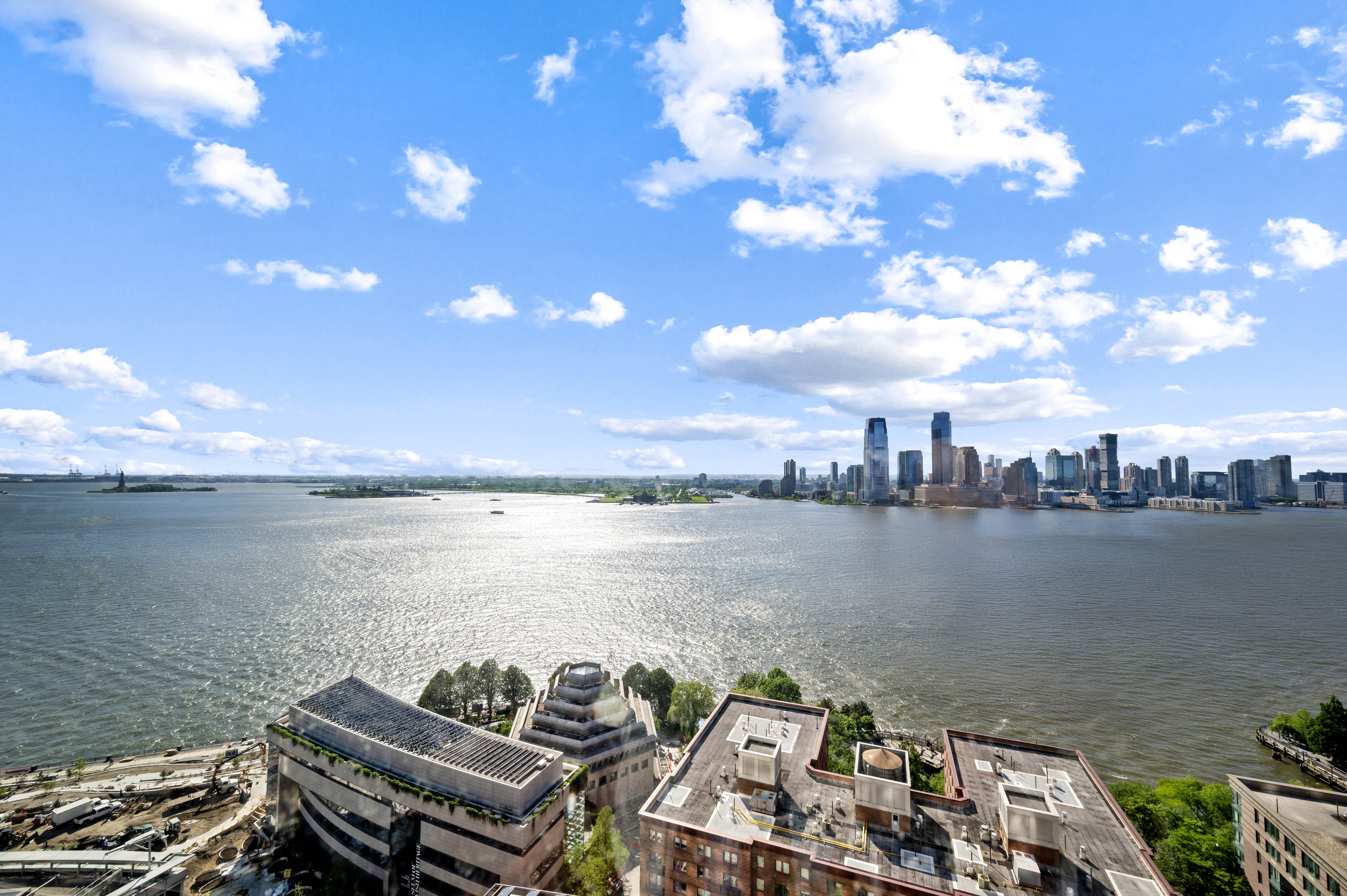 30 West Street, Unit 25G Manhattan, NY 10004 - Photo 4 of 17 a view of a lake