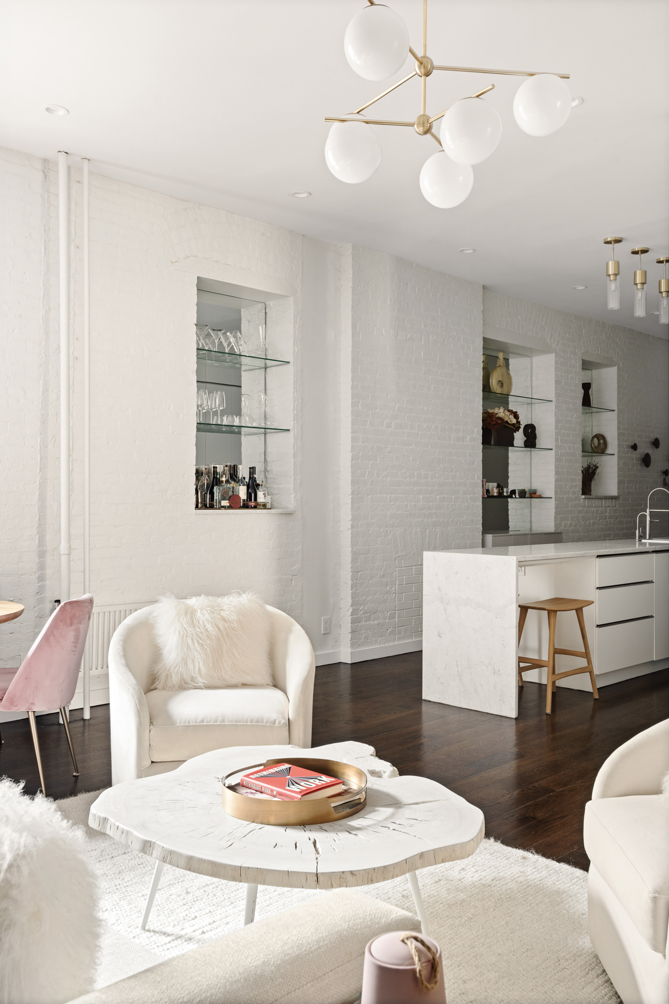 23 East 10th Street, Unit 508 Manhattan, NY 10003 - Photo 8 of 21 a living room with furniture and wooden floor