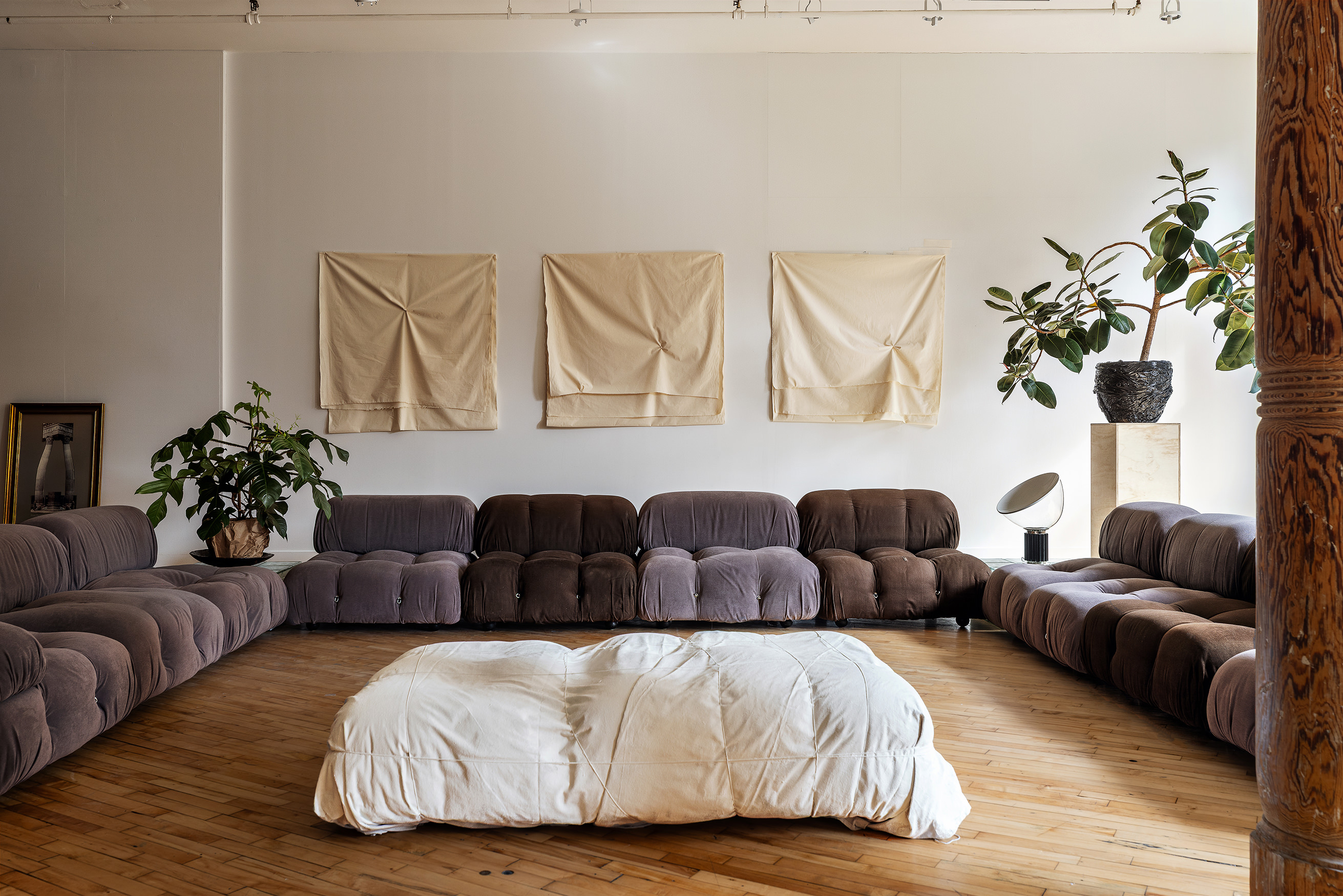 515 Broadway, Unit 4B Manhattan, NY 10012 - Photo 2 of 13 a living room with furniture and a couch