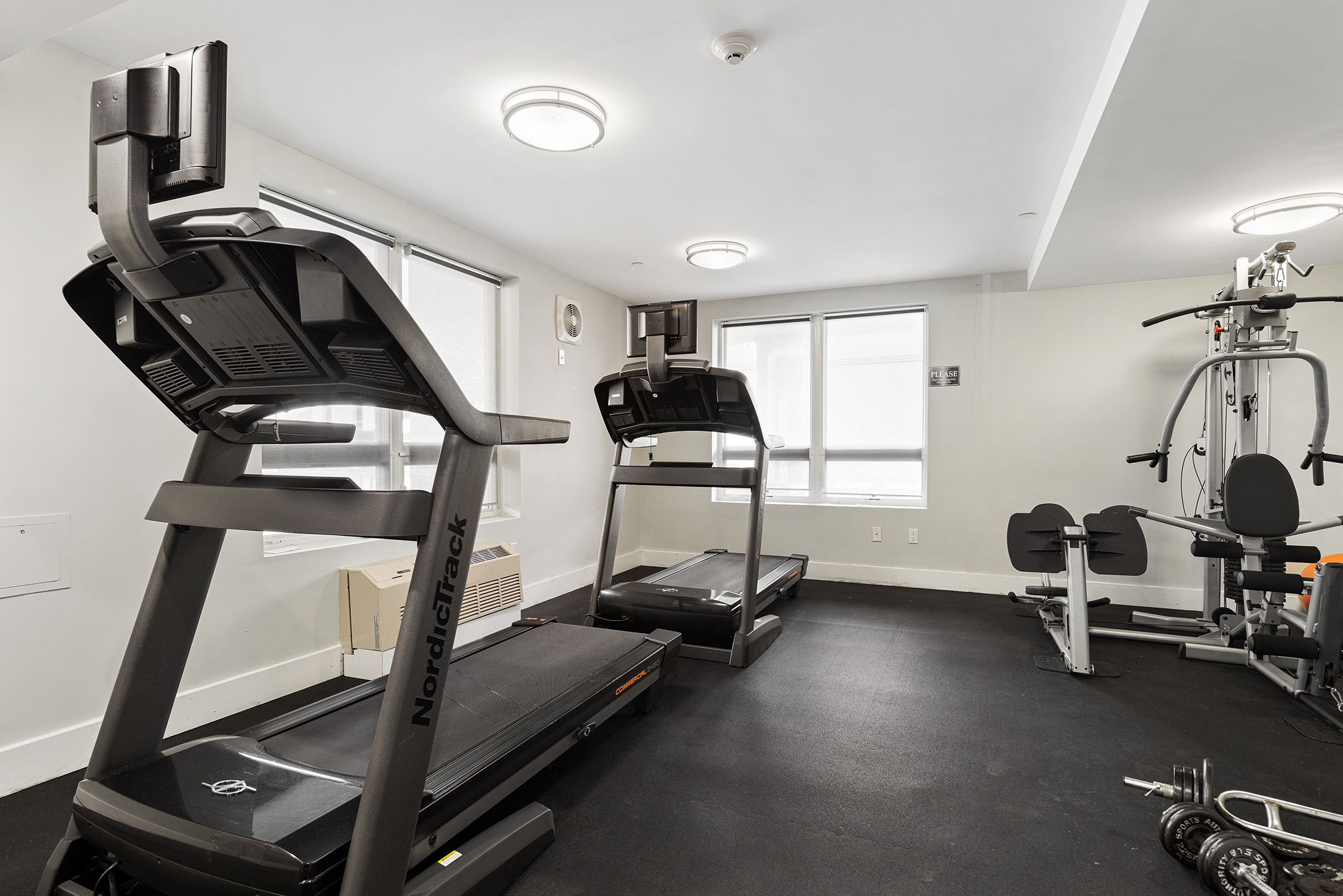 63-34 Fresh Pond Road, Unit 3D Queens, NY 11385 - Photo 10 of 14 a view of a room with gym equipment