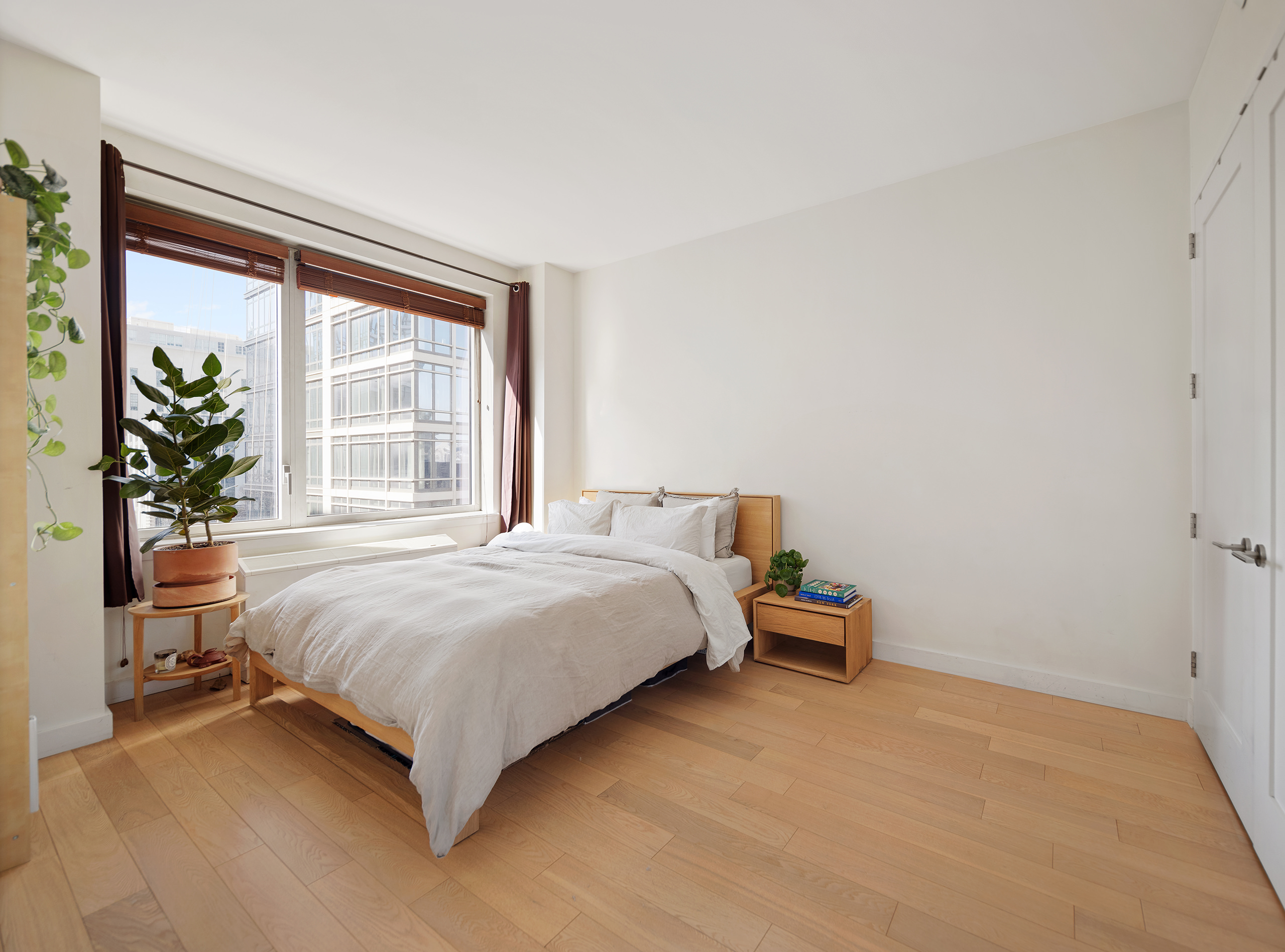 22 North 6th Street, Unit 4P Brooklyn, NY 11249 - Photo 4 of 12 a bedroom with a bed and a window
