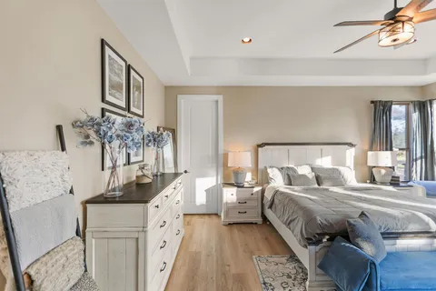 a view of a living room and a floor to ceiling window