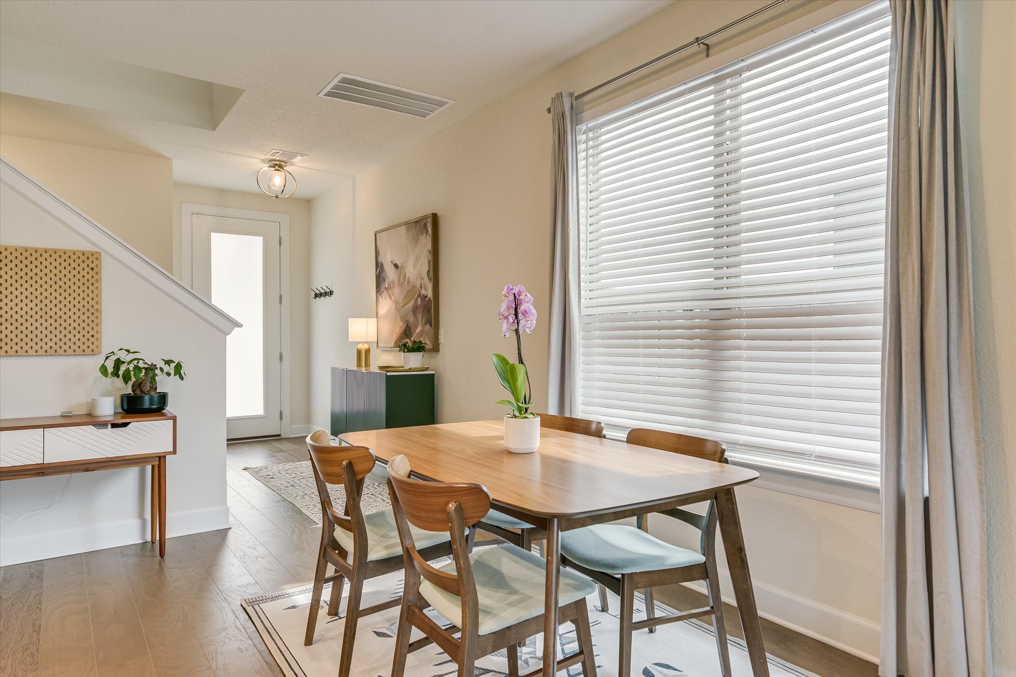 8607 McKamy Drive Austin, TX 78744 - Photo 8 of 28 a dining room with furniture and window