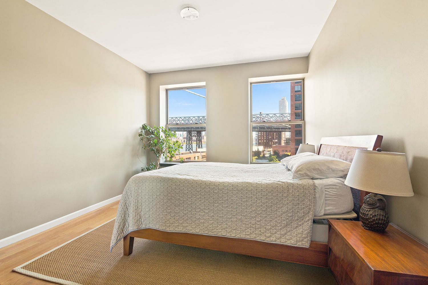 20 Broadway, Unit 501 Brooklyn, NY 11249 - Photo 3 of 8 a bedroom with a bed and window