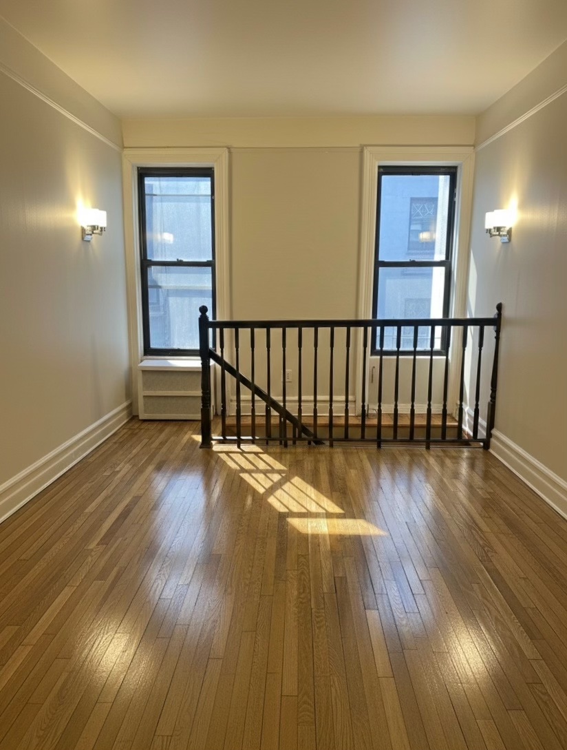 408 8th Avenue, Unit 1C Brooklyn, NY 11215 - Photo 3 of 13 a view of a room with wooden floor