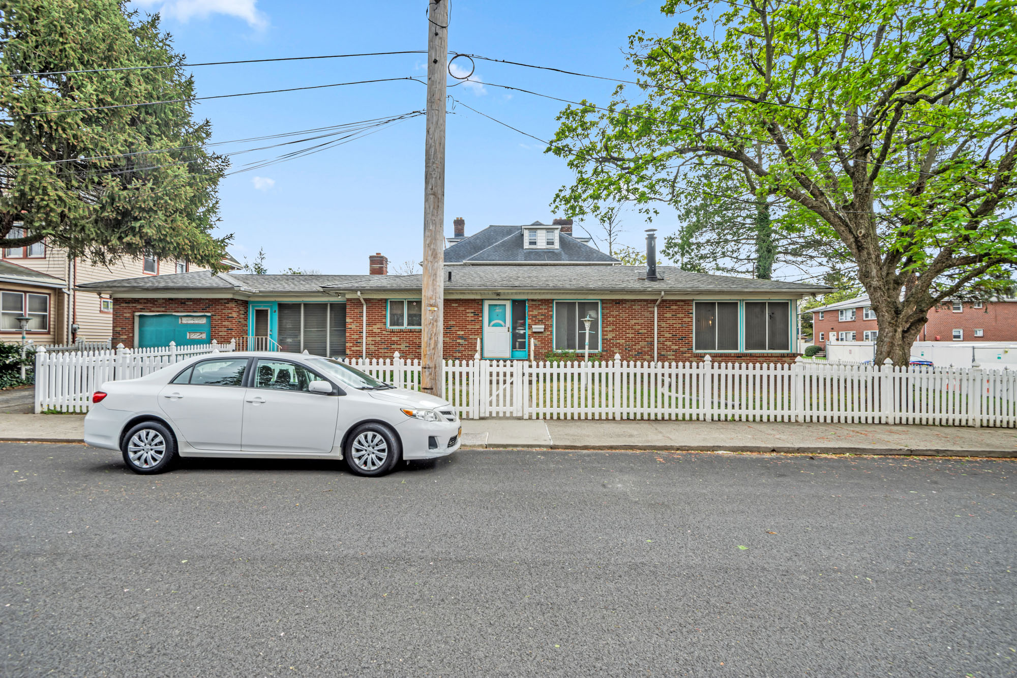 2 Livingston Court Staten Island, NY 10310 - Photo 14 of 14 a car parked in front of a house