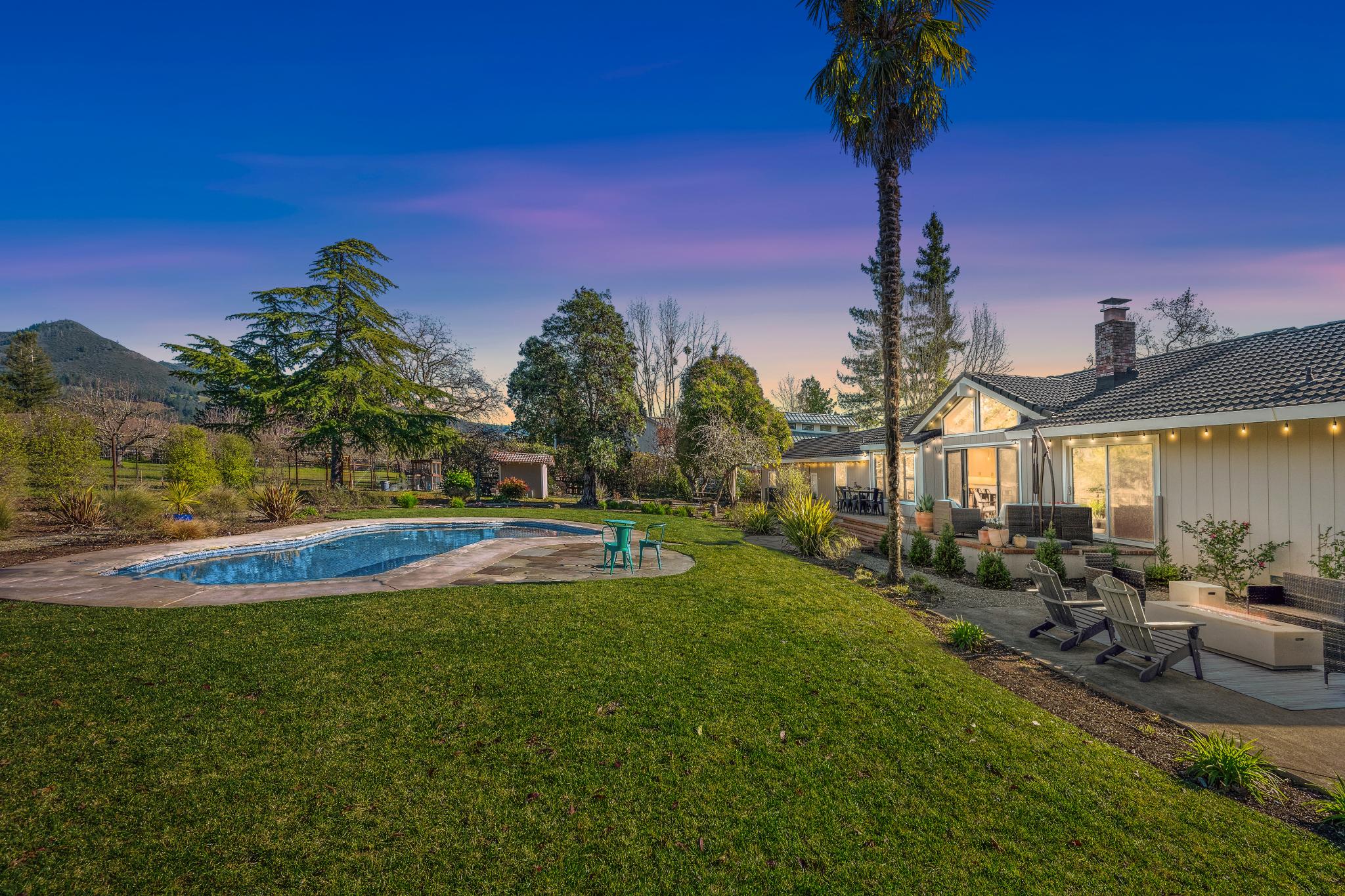 123 Frey Road Santa Rosa, CA 95409 - Photo 2 of 62 a view of a swimming pool with a table and chairs