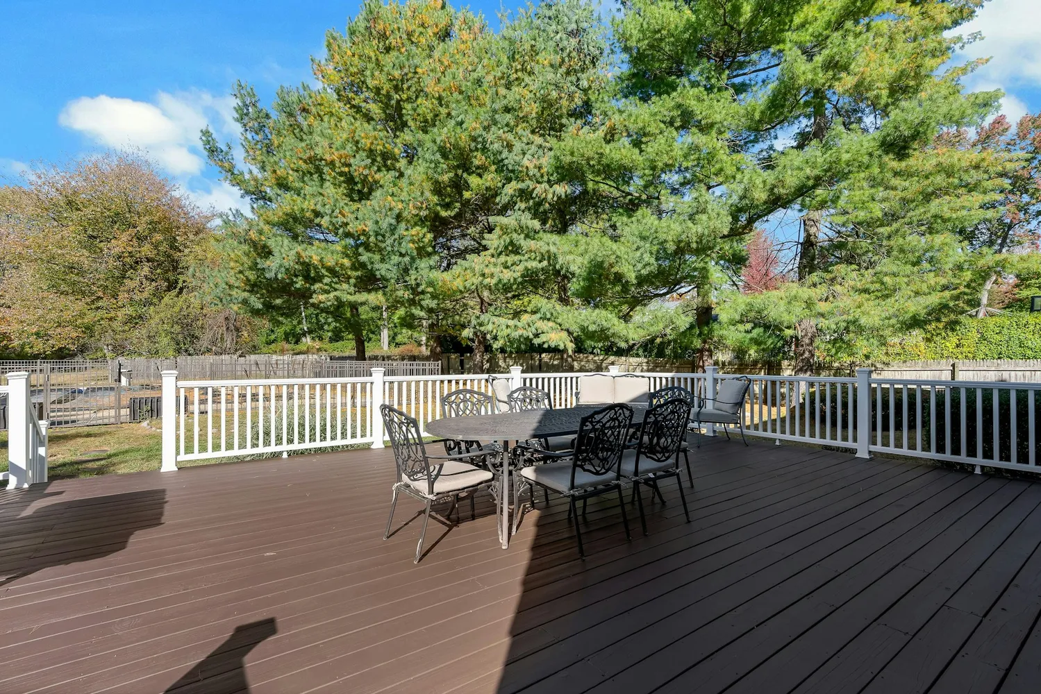 a view of an entryway with wooden floor and door