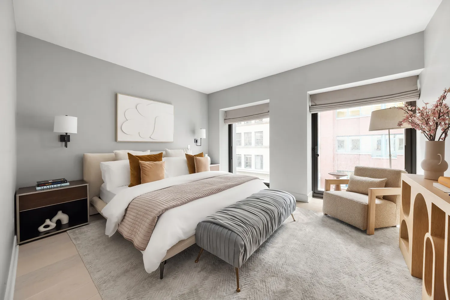 a spacious bedroom with a bed and a couch