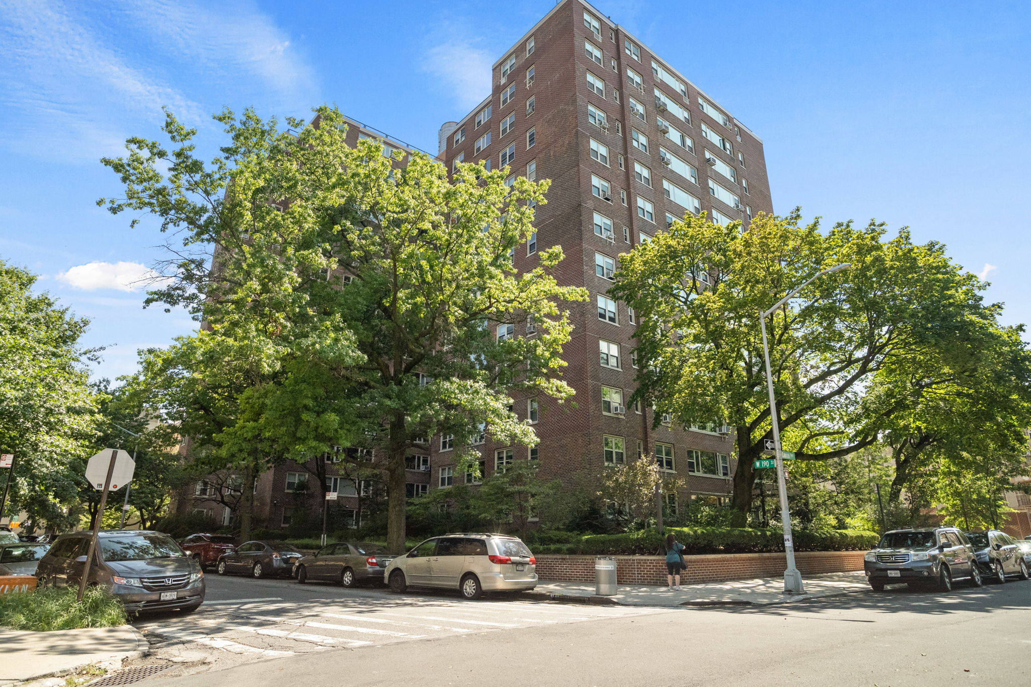 900 West 190th Street, Unit 11J Manhattan, NY 10040 - Photo 11 of 15 a cars parked on the side of a street