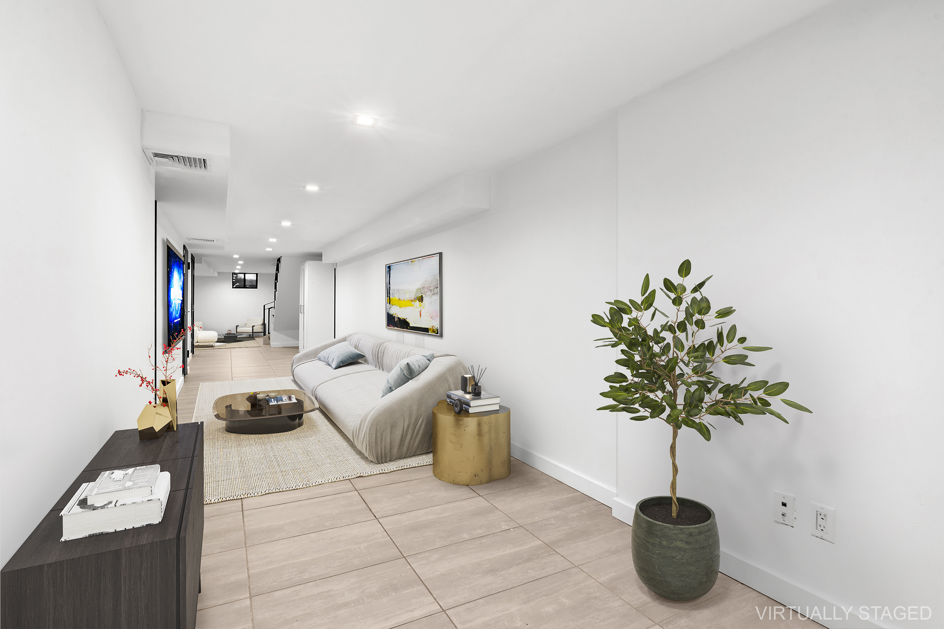 20-27 Menahan Street, Unit 1R Queens, NY 11385 - Photo 12 of 12 a living room with furniture and a potted plant