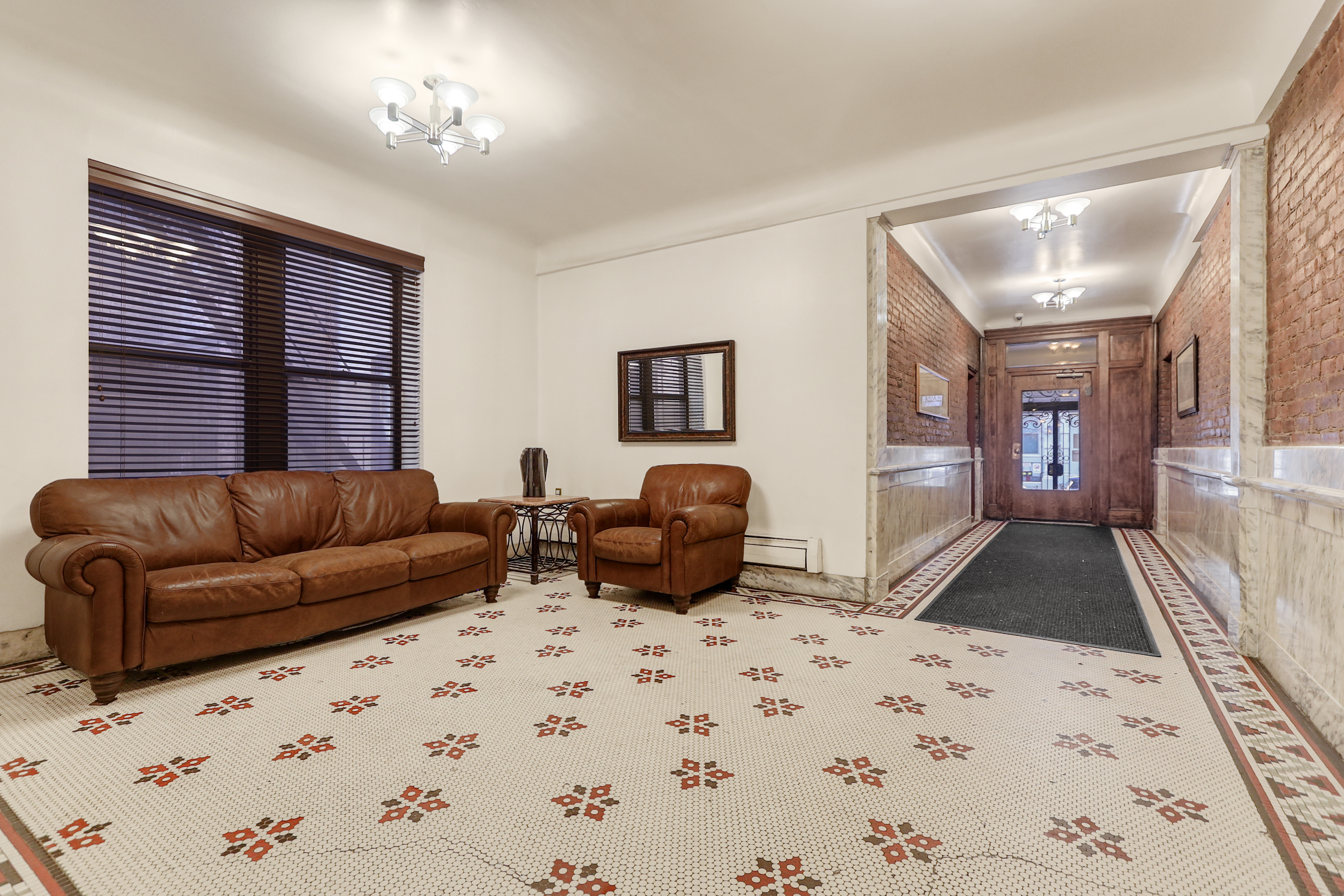 314 West 94th Street, Unit 5D Manhattan, NY 10025 - Photo 10 of 13 a living room with furniture and a large window