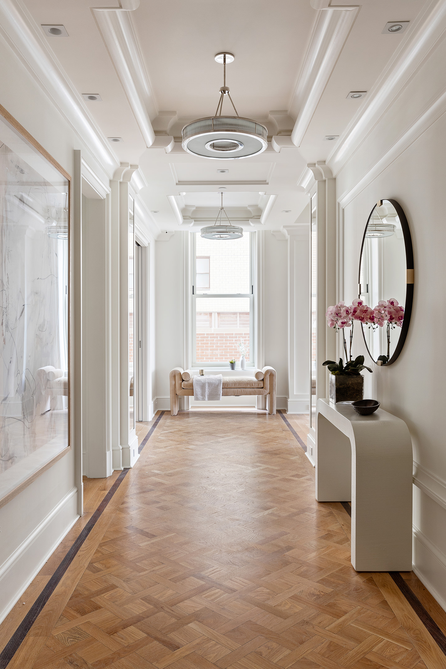 1 Central Park South, Unit 801 Manhattan, NY 10019 - Photo 15 of 21 a living room with furniture a fireplace and a chandelier