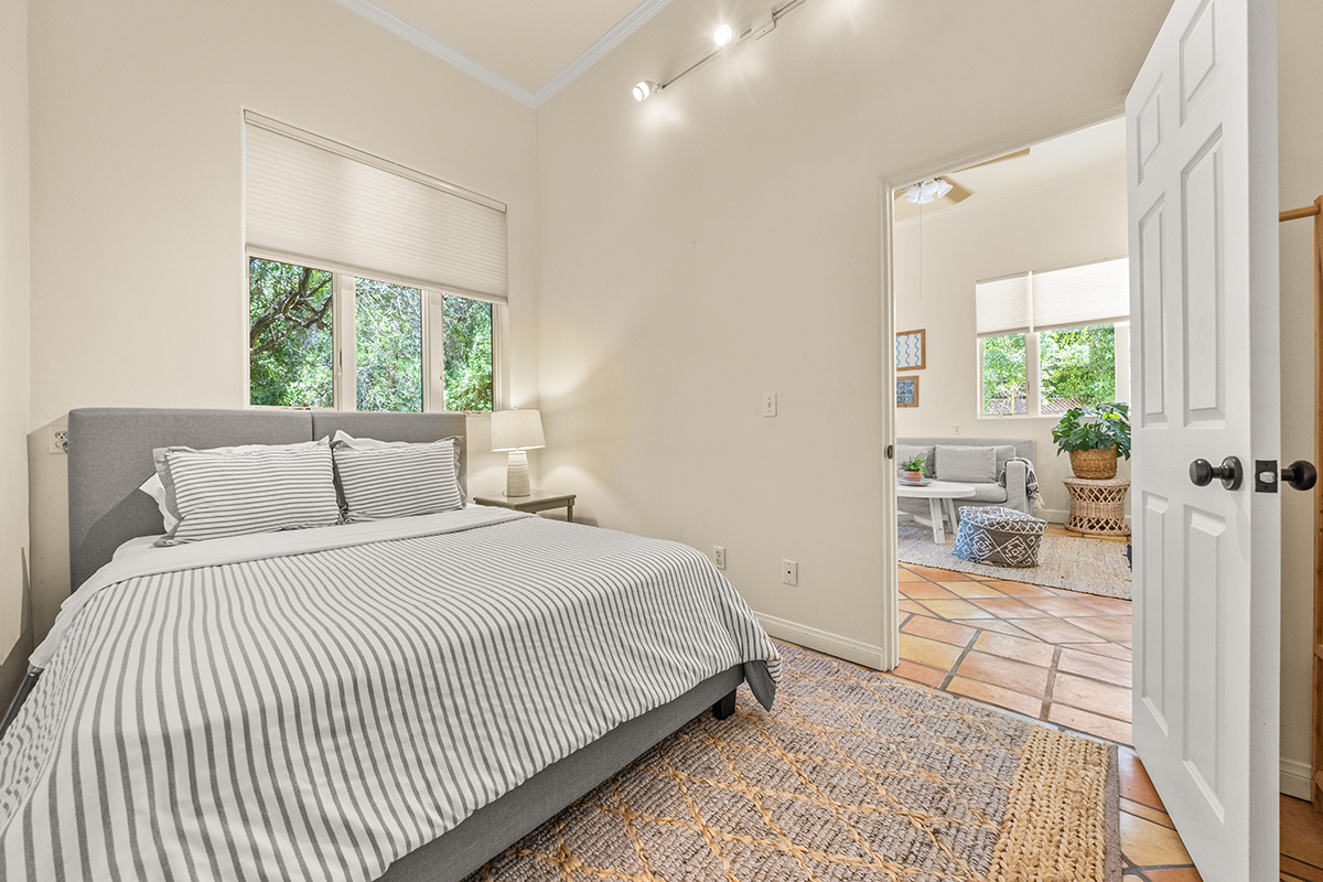 161 Loureyro Road Montecito, CA 93108 - Photo 30 of 52 a bedroom with a bed and a large window