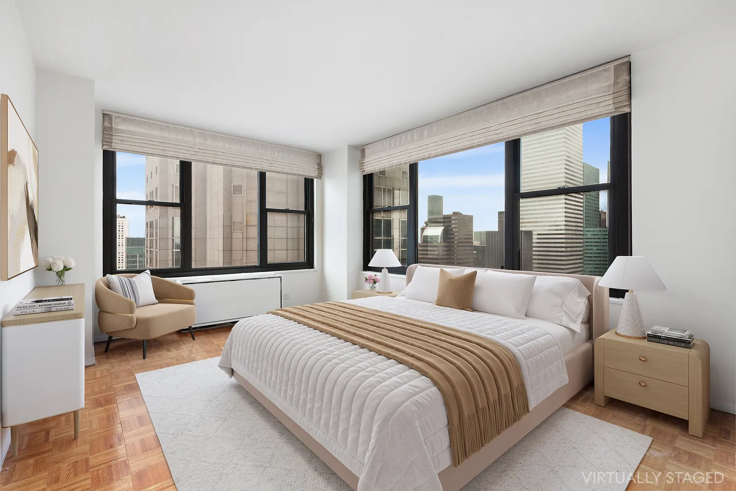 a bedroom with a large bed and a large window