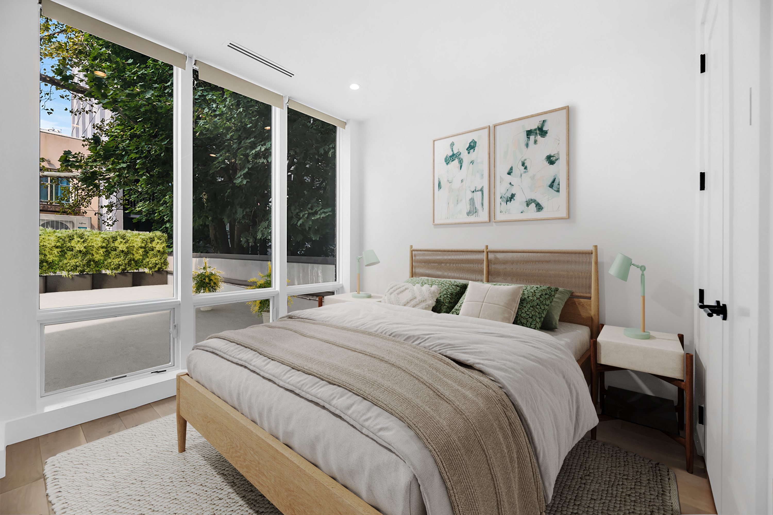 38-26 29th Street, Unit 2 Queens, NY 11101 - Photo 10 of 14 a bedroom with a large bed and a large window