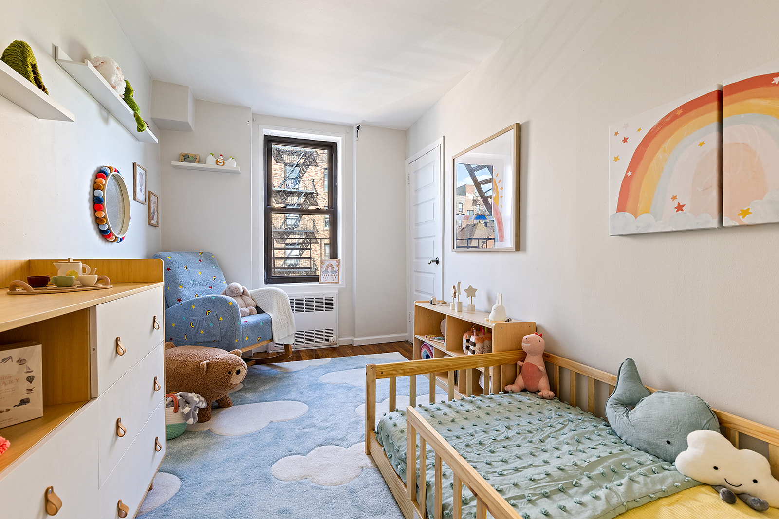 350 Ocean Parkway, Unit 3M Brooklyn, NY 11218 - Photo 4 of 10 a bed room with a bed and a couch