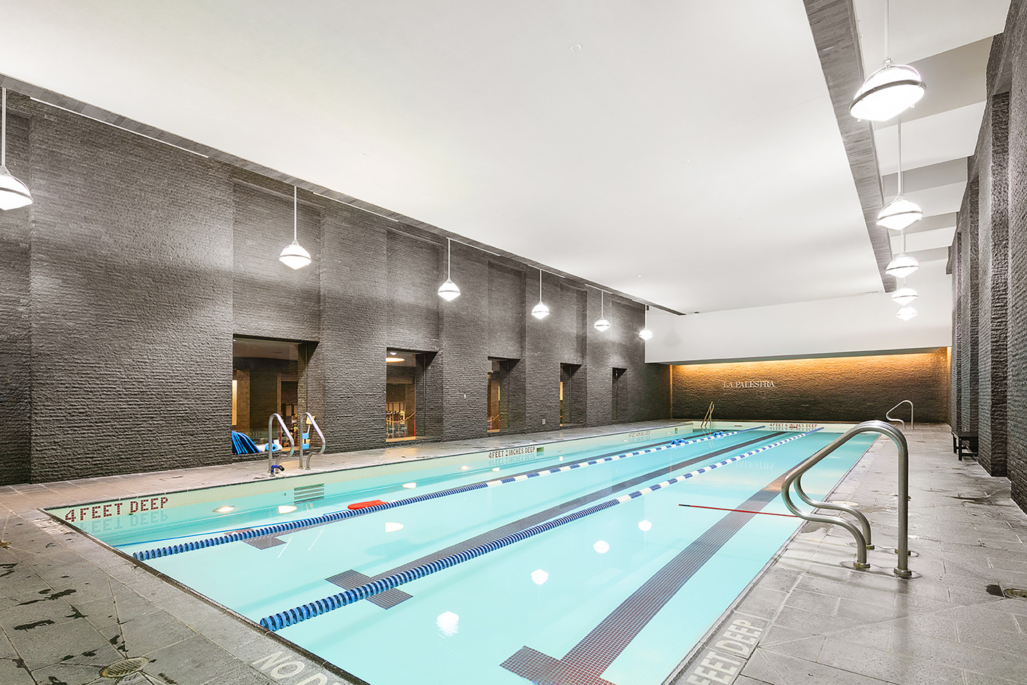 50 Riverside Boulevard, Unit 14L Manhattan, NY 10069 - Photo 13 of 22 a bathroom with a double vanity sink and a large mirror