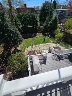 a view of outdoor sitting area with furniture