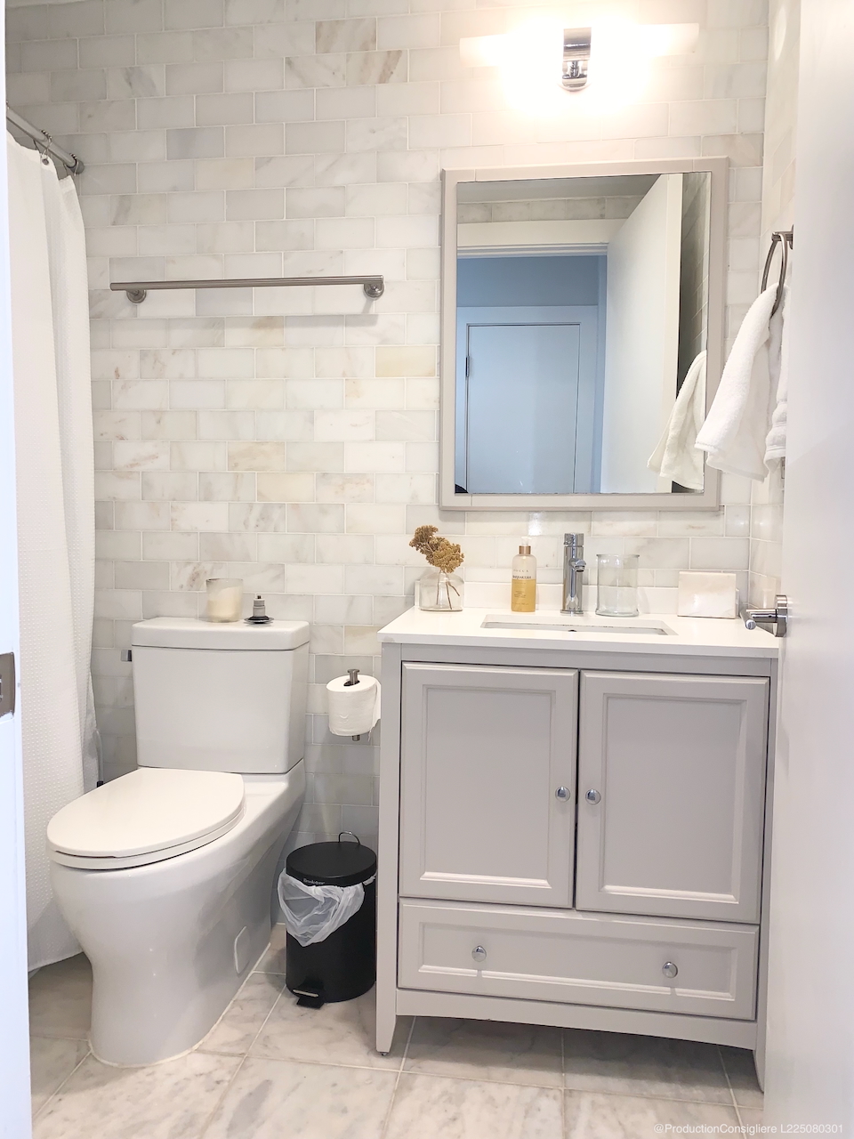 139-141 West 126th Street, Unit 4B Manhattan, NY 10027 - Photo 12 of 13 a bathroom with a toilet sink and mirror