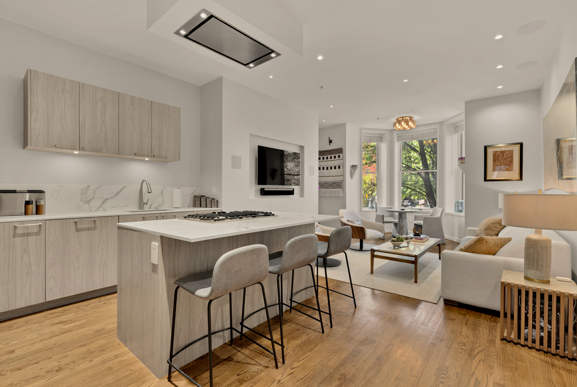 1407 15th Street Northwest, Unit 2 Washington, DC 20005 - Photo 3 of 24 a living room with furniture and a flat screen tv