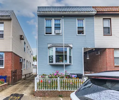 a front view of a house with a porch