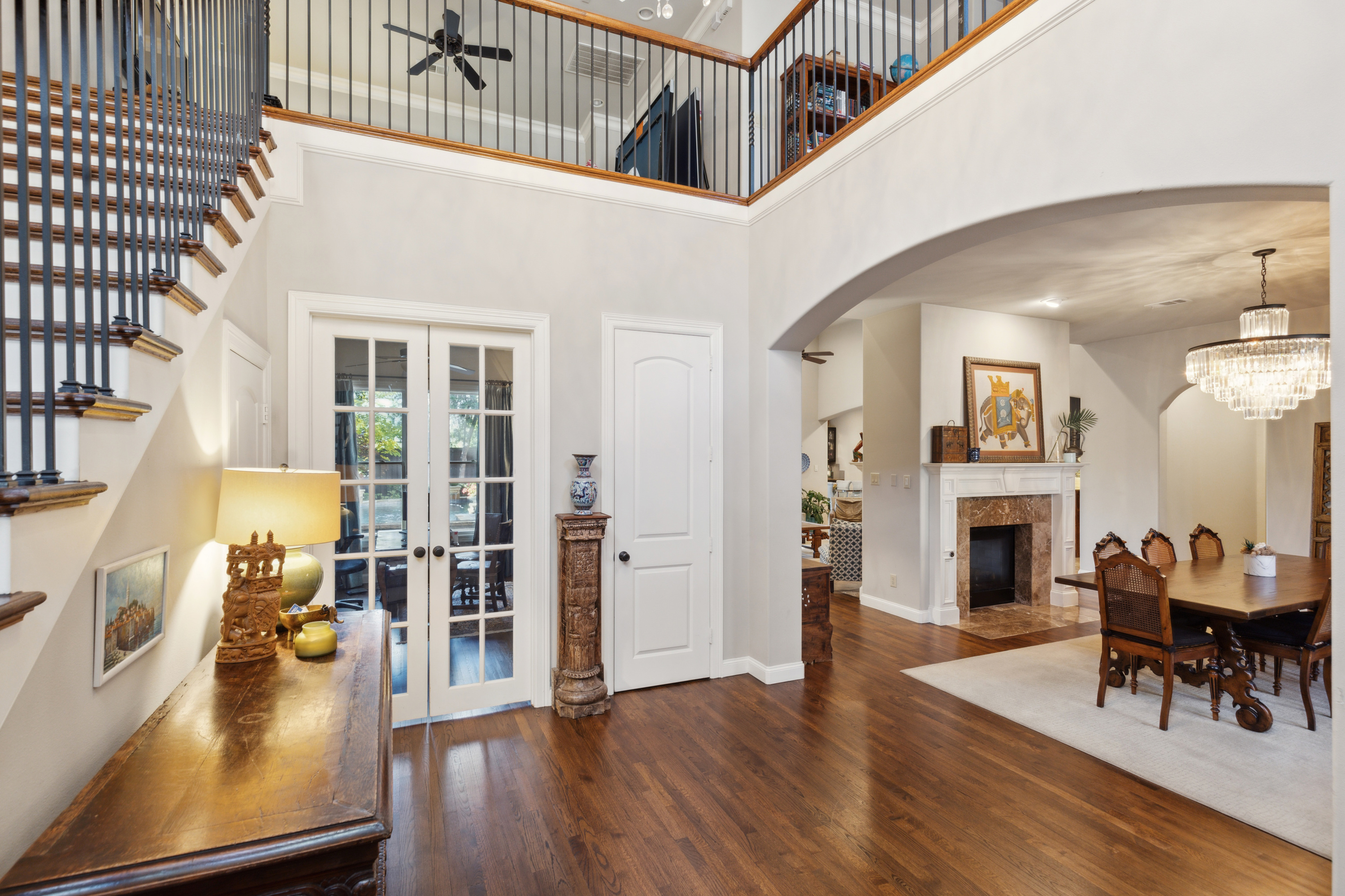 8411 Midway Road Dallas, TX 75209 - Photo 24 of 29 a living room with fireplace furniture and a wooden floor