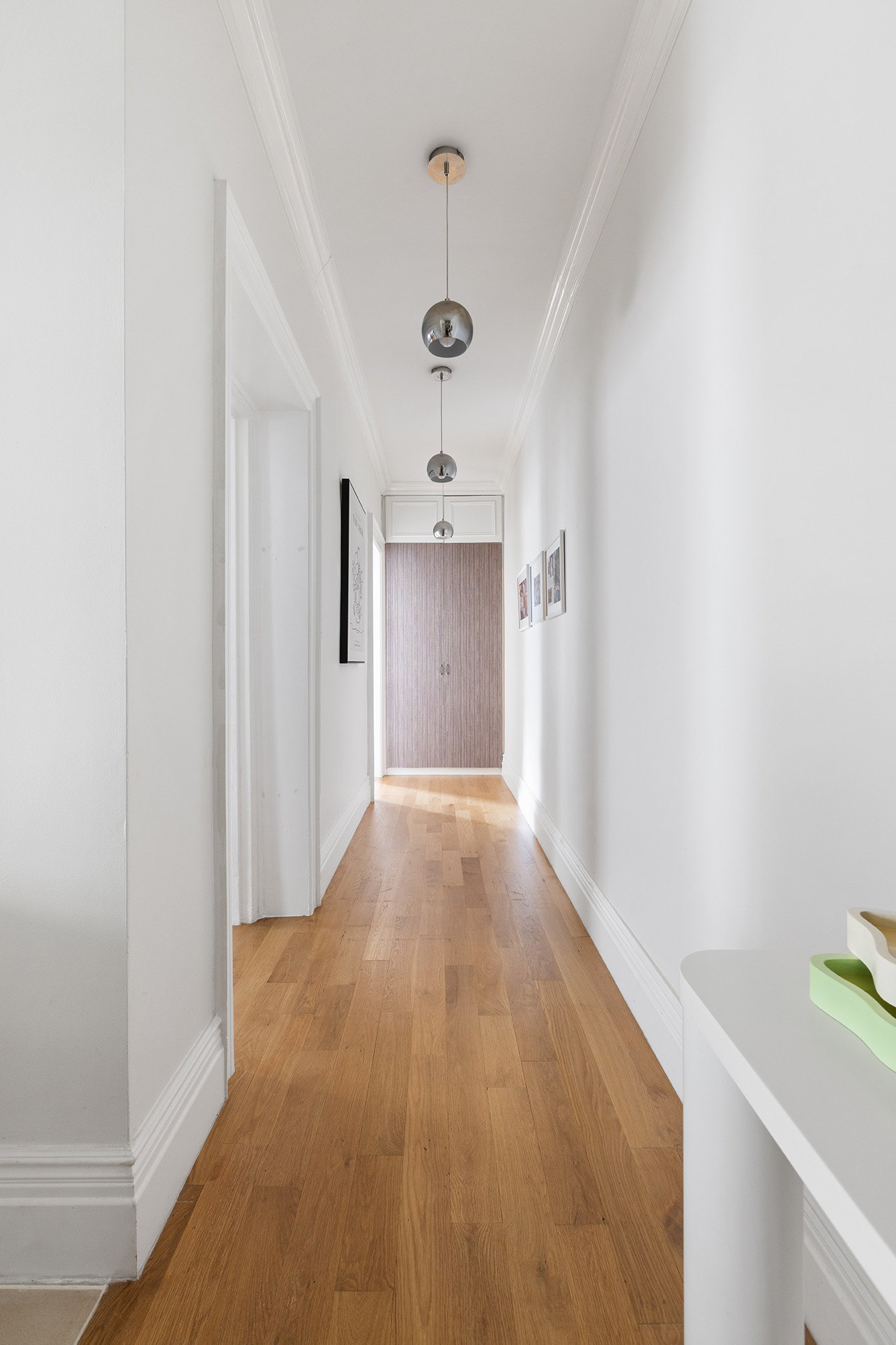 229 West 97th Street, Unit 5M New York, NY 10025 - Photo 8 of 11 a view of a hallway view with wooden floor