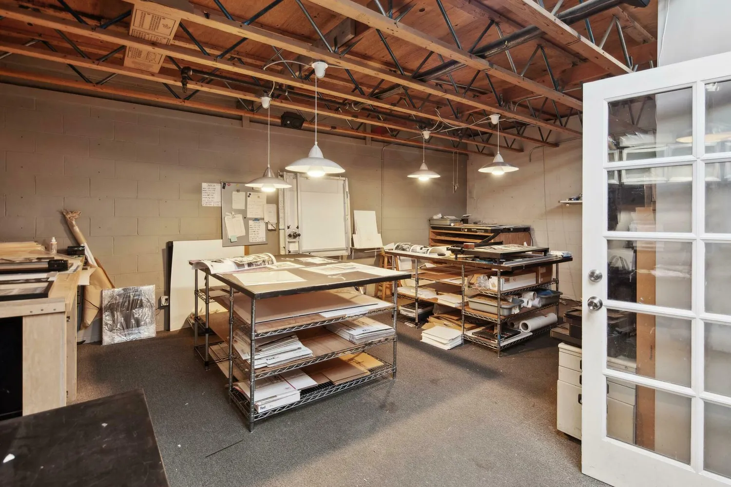 a view of a workspace with furniture