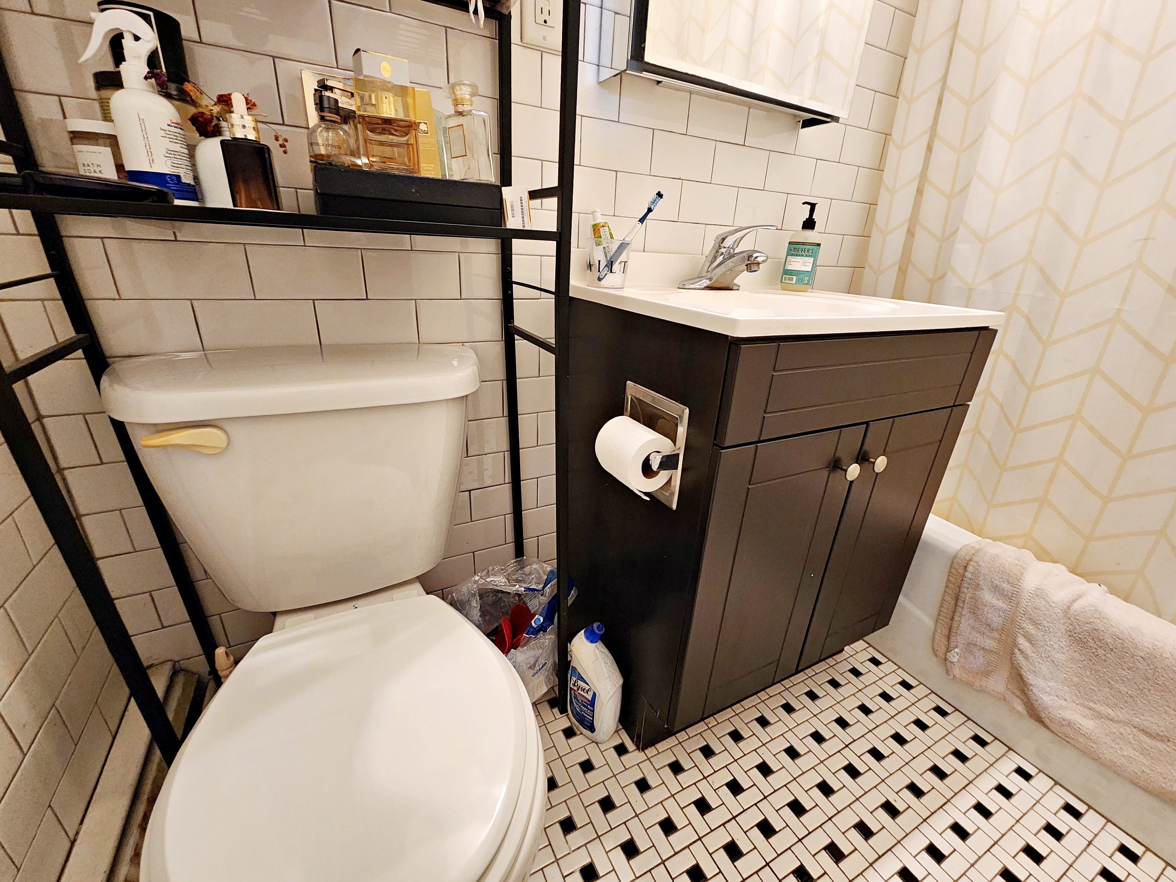 142 Frost Street, Unit 3F Brooklyn, NY 11211 - Photo 6 of 6 a bathroom with a sink toilet and shower