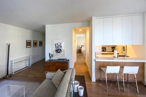 a living room with furniture and a couch