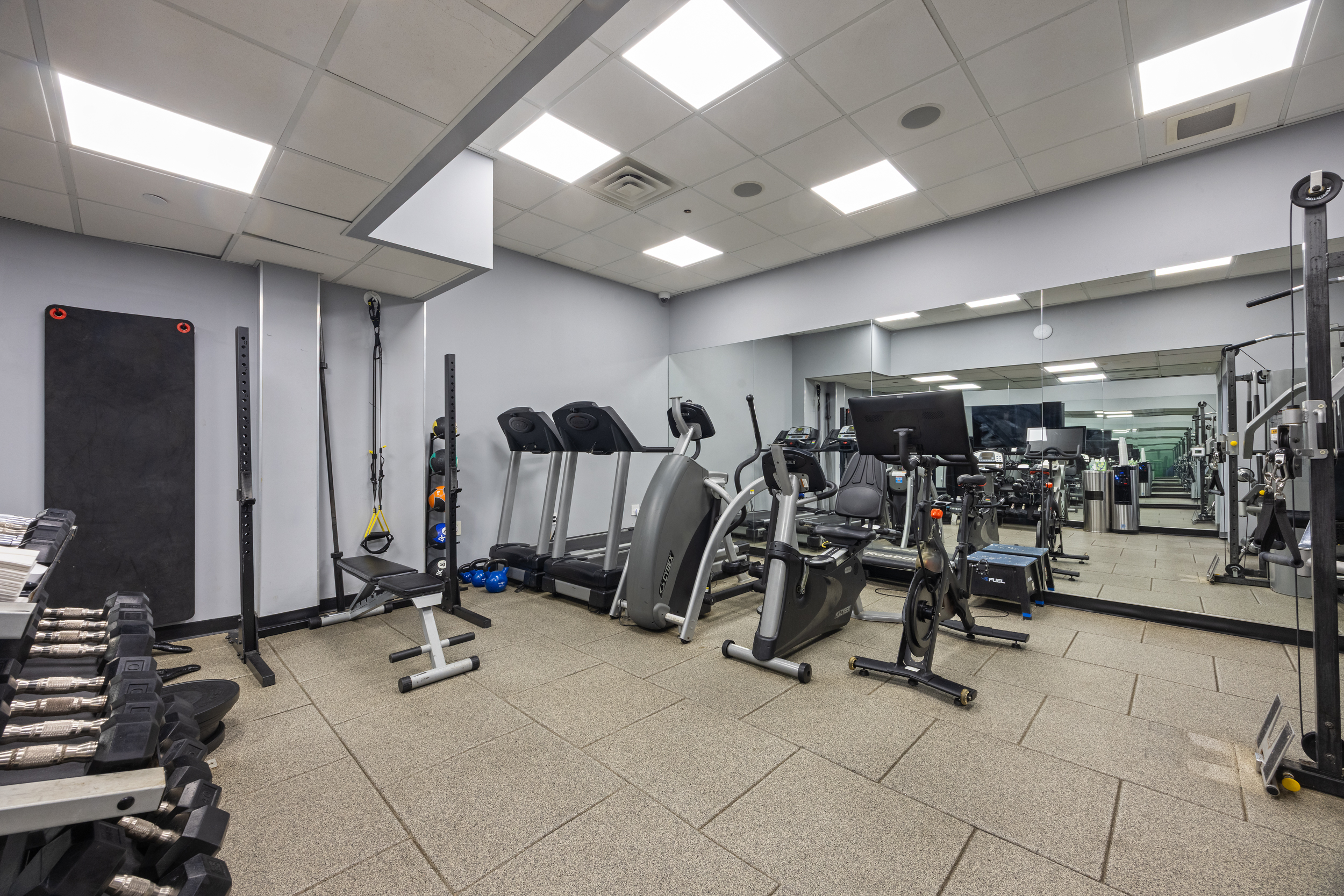 157 East 84th Street, Unit THA Manhattan, NY 10028 - Photo 29 of 33 a view of a room with gym equipment