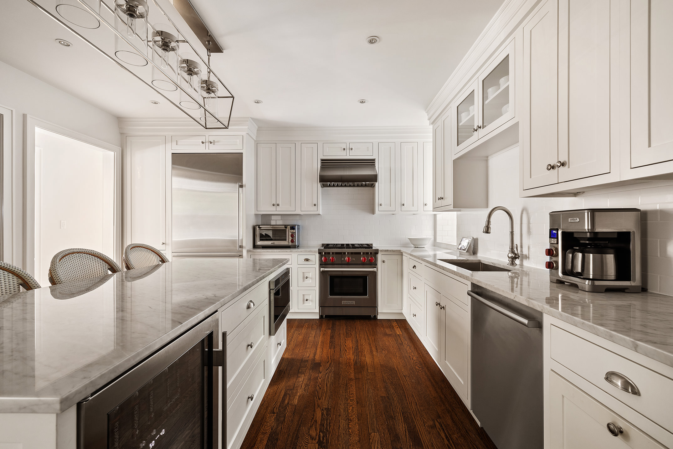 201 West 89th Street, Unit 2F Manhattan, NY 10024 - Photo 10 of 20 a kitchen with granite countertop stainless steel appliances cabinets a sink and a counter top space