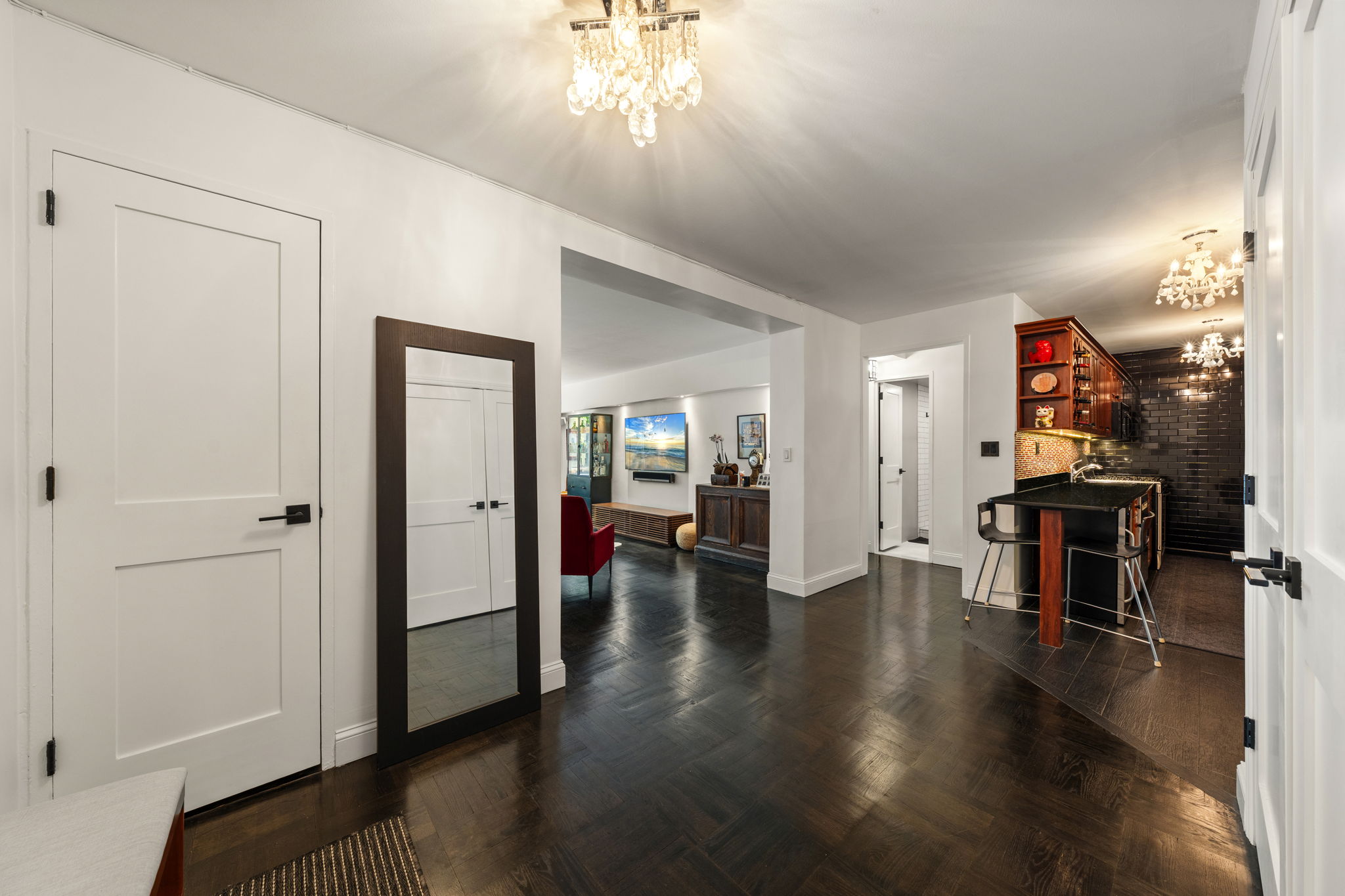 310 Lexington Avenue, Unit 2J Manhattan, NY 10016 - Photo 5 of 11 a view of a livingroom with furniture and wooden floor
