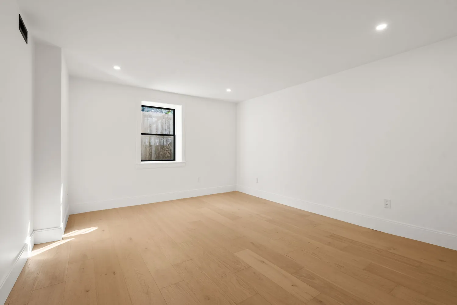 an empty room with a window