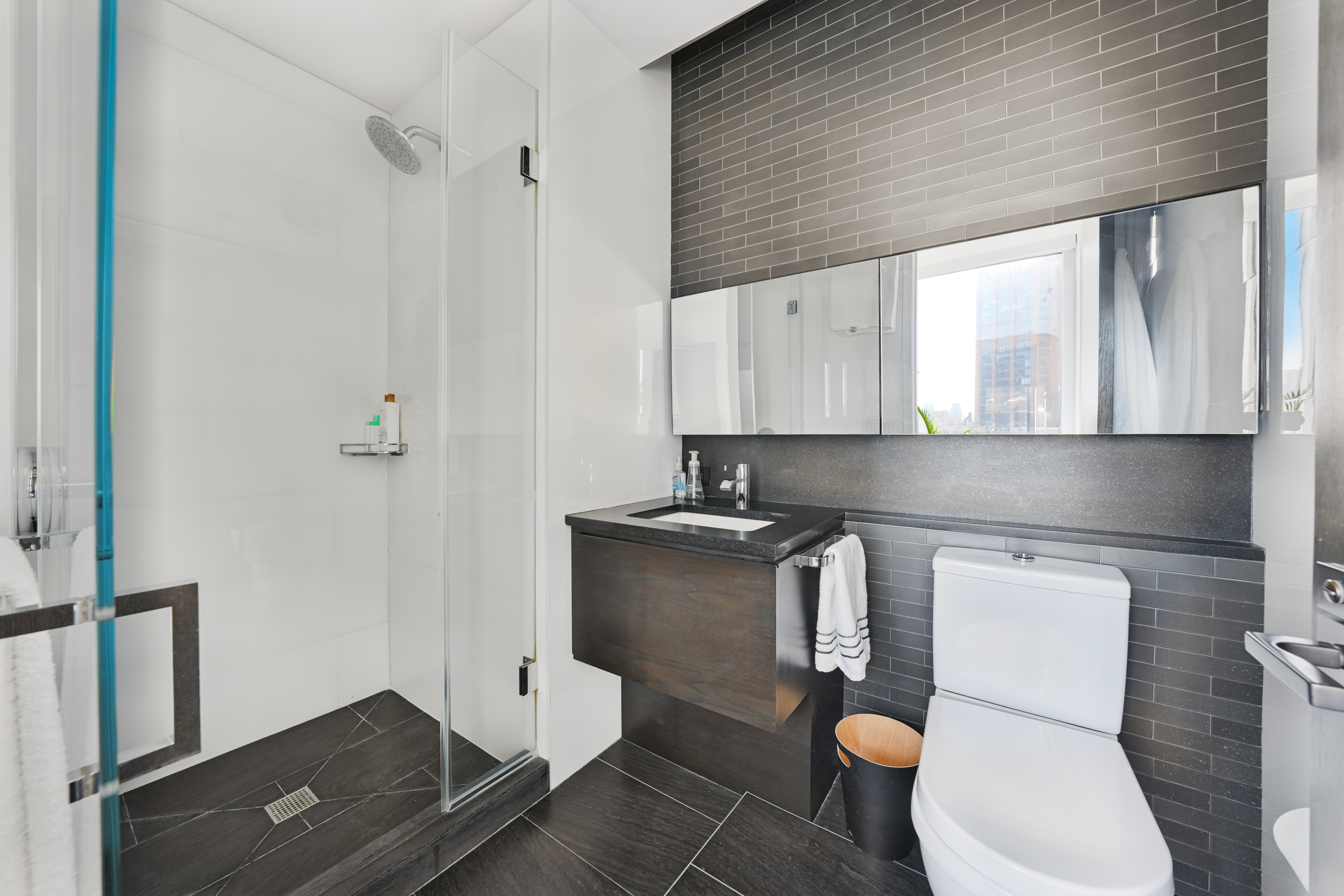 172 Madison Avenue, Unit 24B Manhattan, NY 10016 - Photo 12 of 16 a kitchen with a toilet a sink and a stove