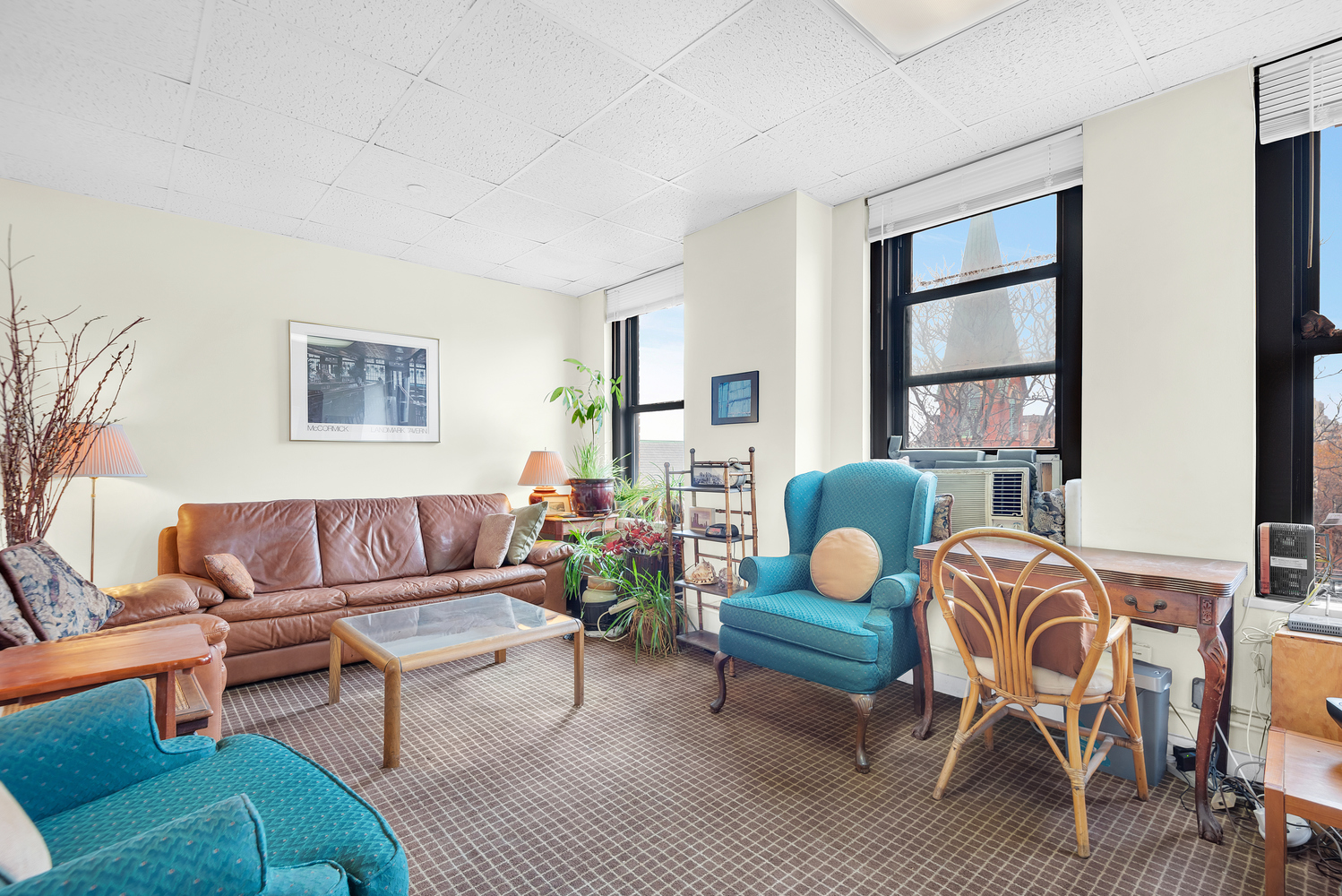 142 Joralemon Street, Unit 5E Brooklyn, NY 11201 - Photo 1 of 6 a living room with furniture and a window
